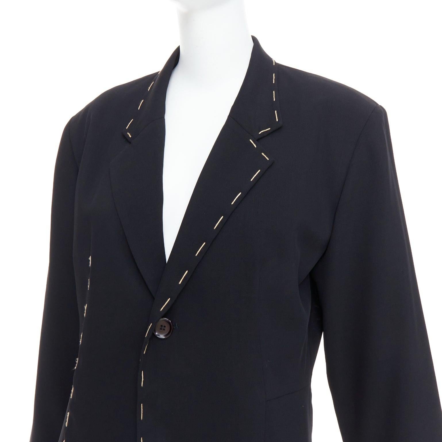 YOHJI YAMAMOTO black wool blend handstitched detail long blazer coat S
Reference: PRWU/A00130
Brand: Yohji Yamamoto
Material: Wool, Blend
Color: Black, Cream
Pattern: Solid
Closure: Button
Lining: Black Fabric
Extra Details: Shoulder padded.
Made
