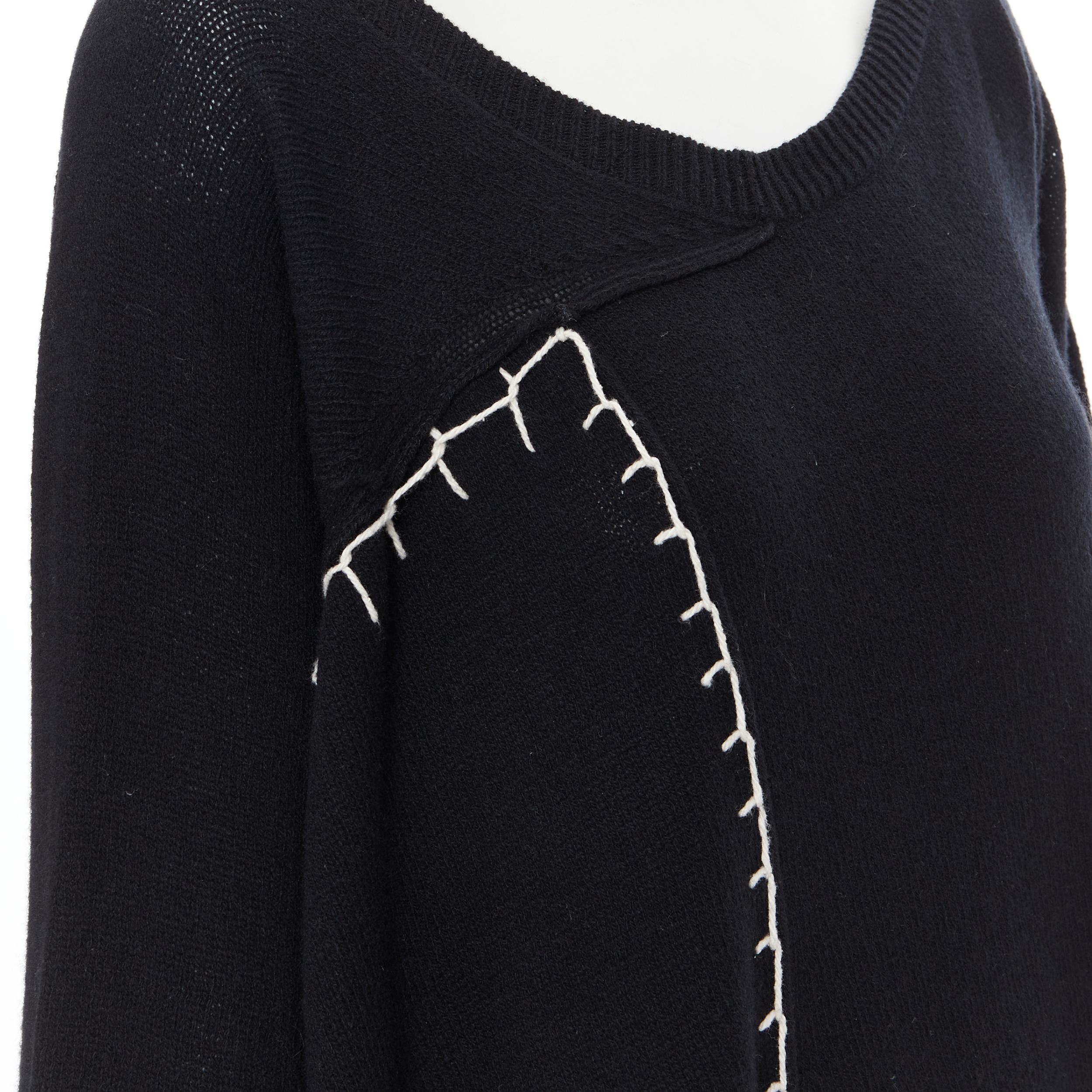 YOHJI YAMAMOTO black wool cotton white whipstitch open side tunic sweater JP2 
Reference: AEMA/A00032 
Brand: Yohji Yamamoto 
Designer: Yohji Yamamoto 
Material: Wool 
Color: Black 
Pattern: Solid 
Extra Detail: Whipstitch detail. Scoop neck. Slit
