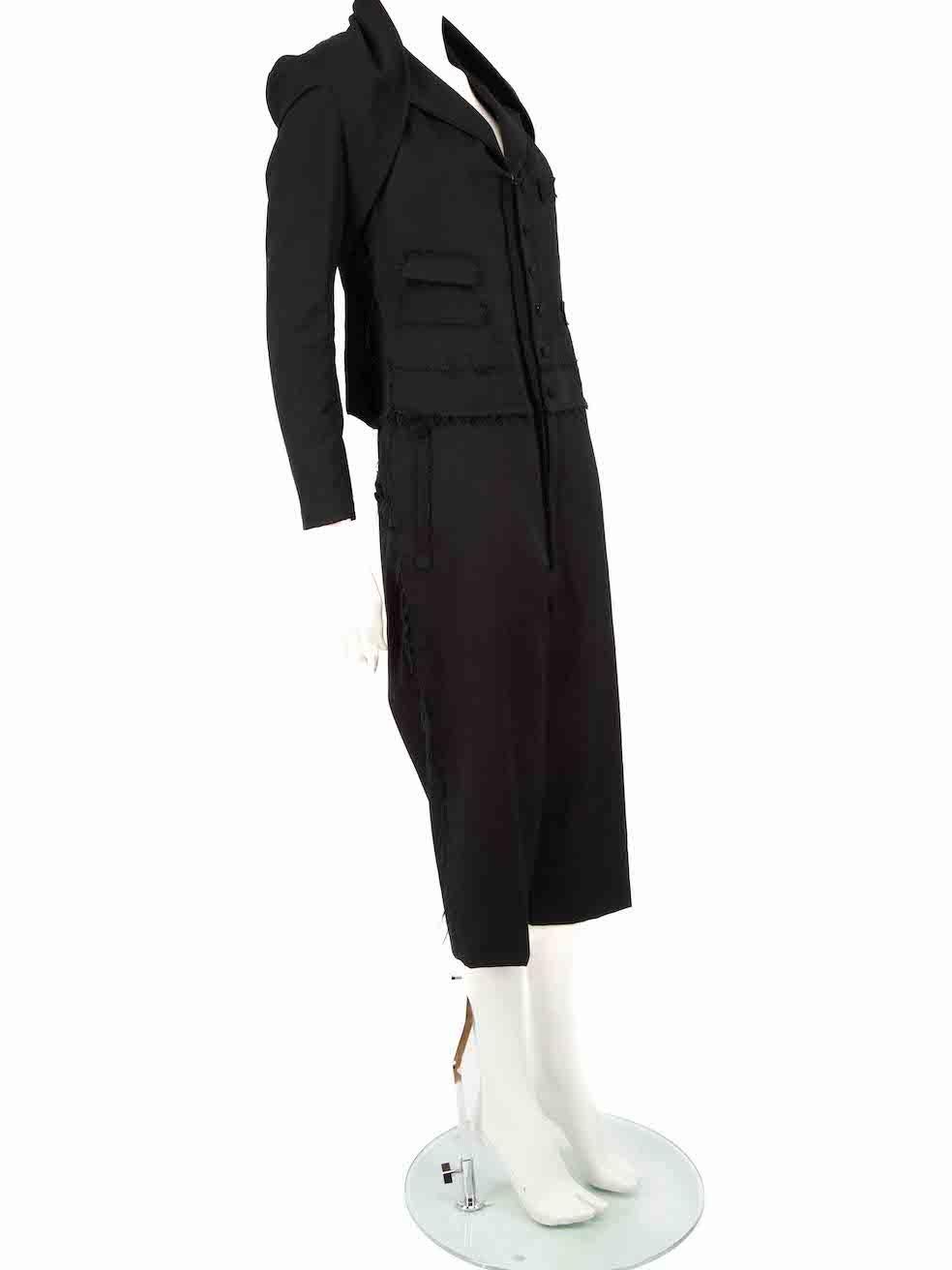 CONDITION is Very good. Hardly any visible wear to set is evident on this used Yohji Yamamoto designer resale item. Please note this jumpsuit is purposely distressed.
 
 
 
 Details
 
 
 Black
 
 Wool
 
 Jumpsuit and jacket set
 
 Long sleeve