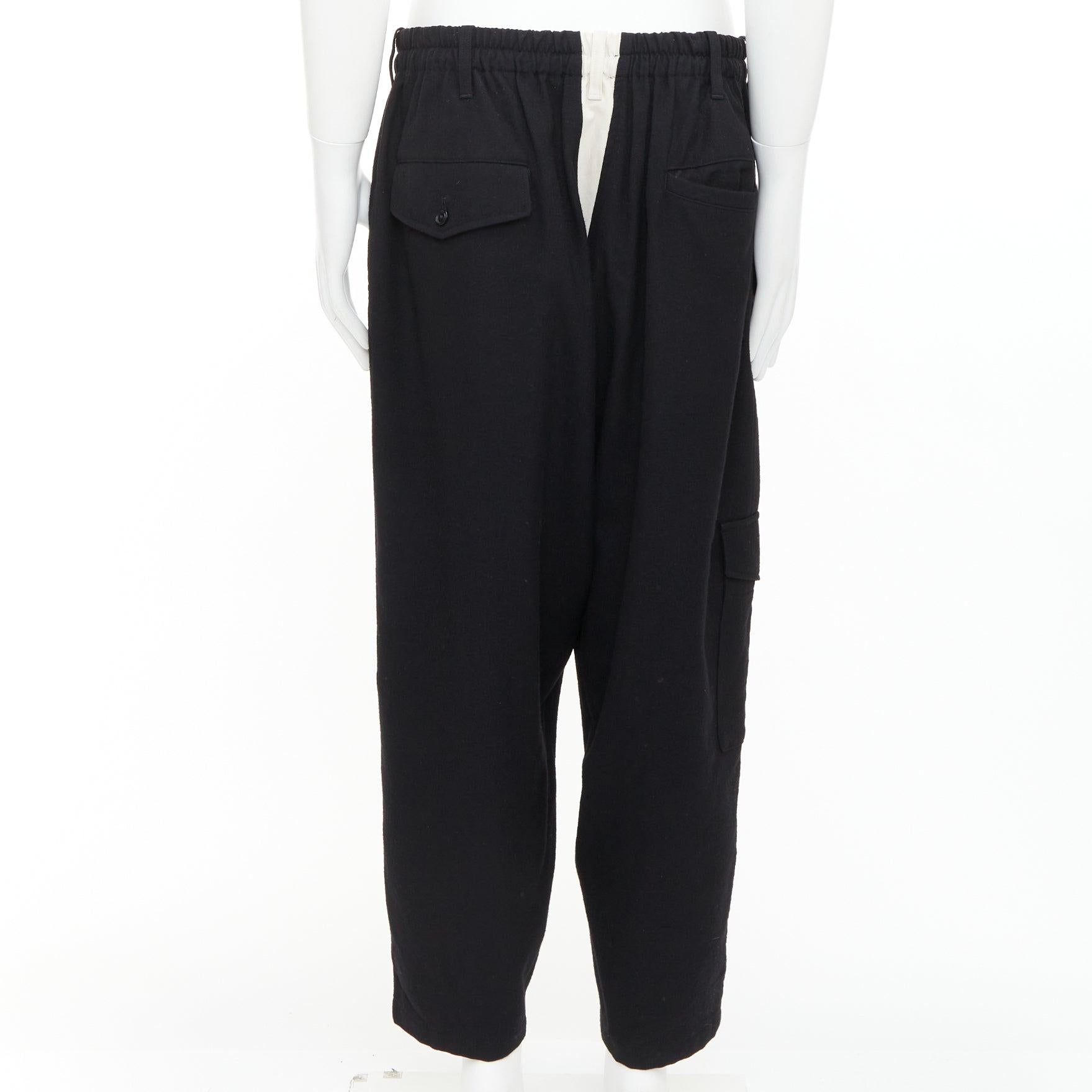 YOHJI YAMAMOTO pantalon à jambe large JP3 L en laine noire et coton blanc avec boutons. Excellent état - En vente à Hong Kong, NT