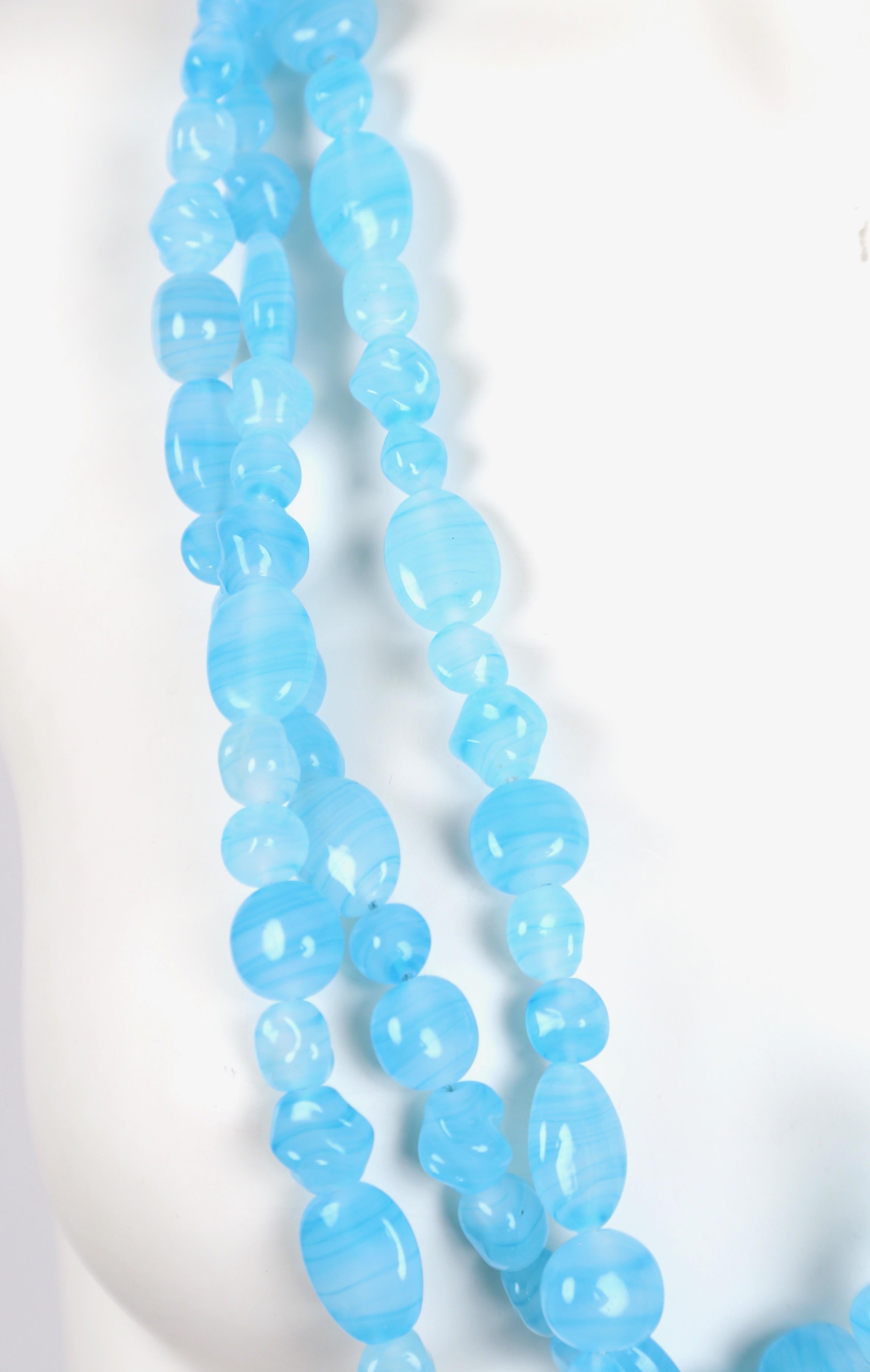 Vivid, blue glass beaded necklace designed by Yohji Yamamoto as worn in one of his few New York runway shows dating the early 2000's. The necklace is unlabeled and measures approximately 34-38