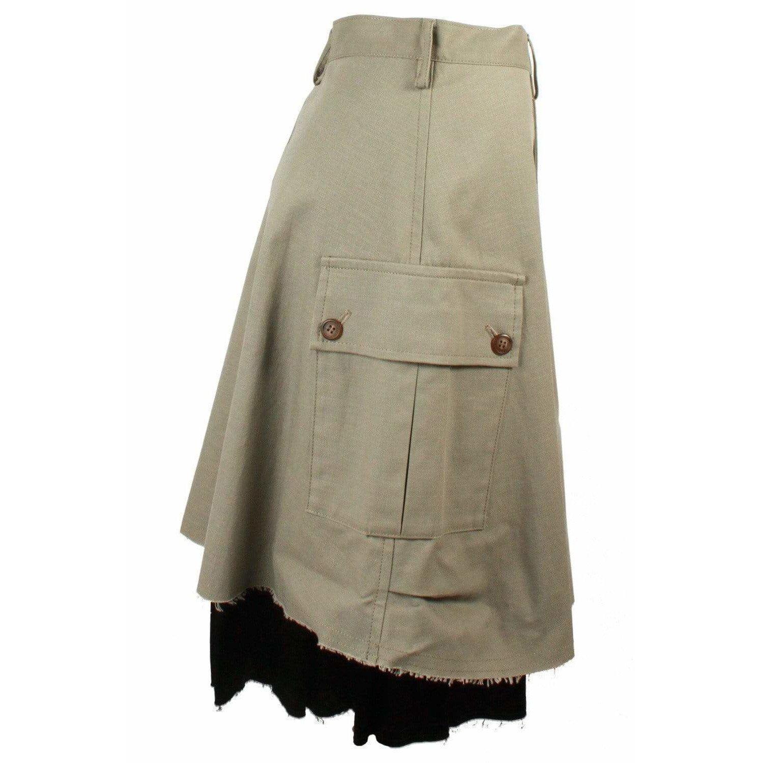 Double layered cargo skirt is khaki with longer black layer beneath, by Yohji Yamamoto. Buttoned, zip front closure with belt loops. Raw-cut hems with side cargo pockets.