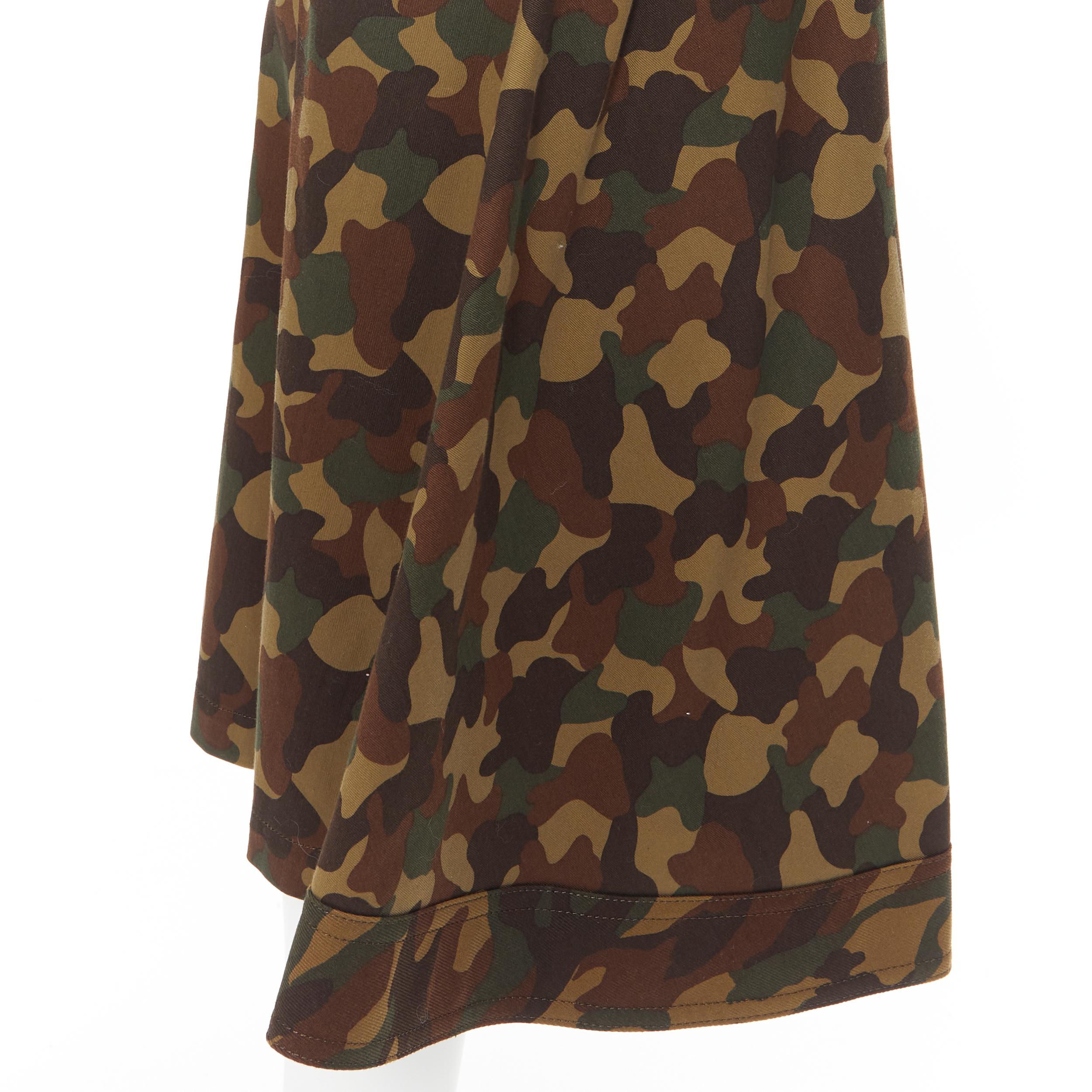 YOHJI YAMAMOTO convertible green camouflage print culotte shorts skirt JP1 S 
Reference: ANSN/A00199 
Brand: Yohji Yamamoto 
Material: Cotton 
Color: Green 
Pattern: Camouflage 
Extra Detail: Convertible from skirt to culotte shorts. Worn as pencil