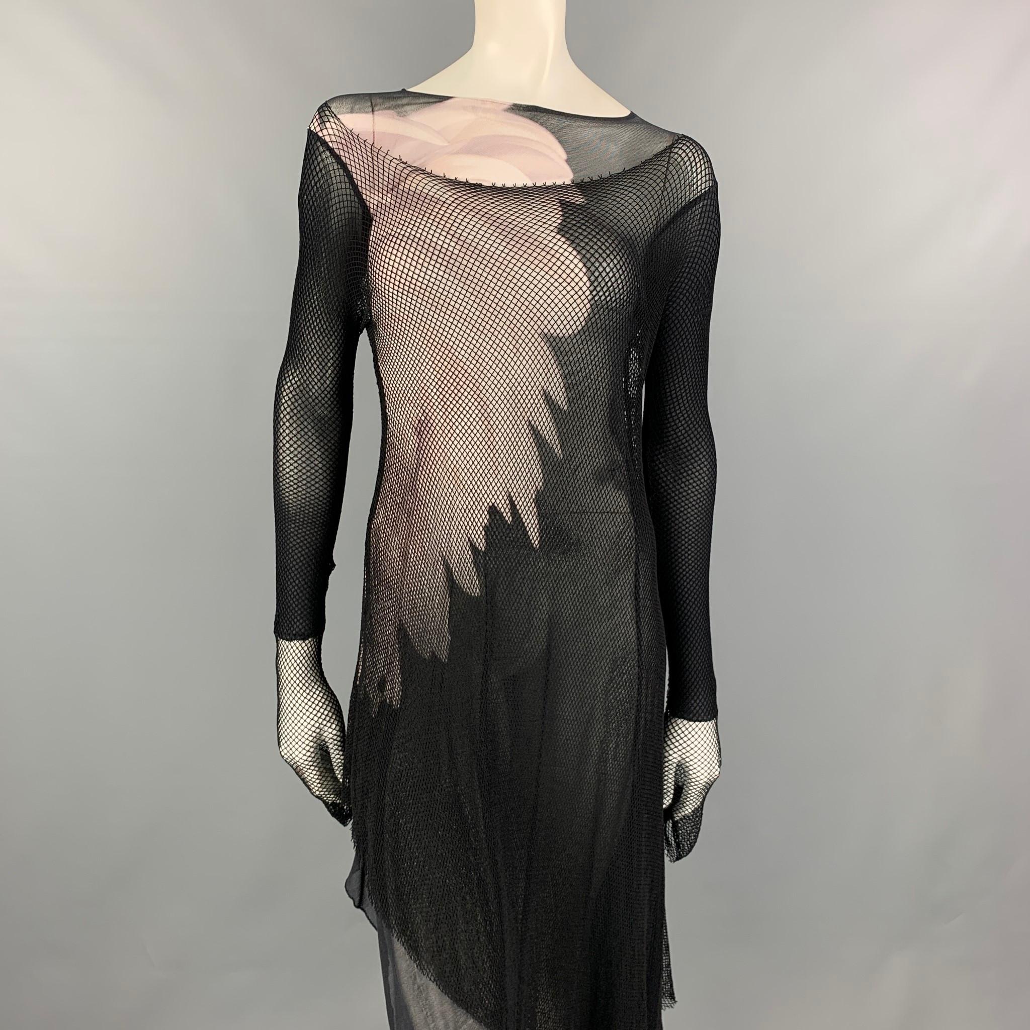 YOHJI YAMAMOTO Fall 2011 Collection dress comes in black & grey photo print material with a mesh overlay design featuring a asymmetrical style, long sleeves, and a wide neckline. 

Very Good Pre-Owned Condition. Fabric tag removed.
Marked: