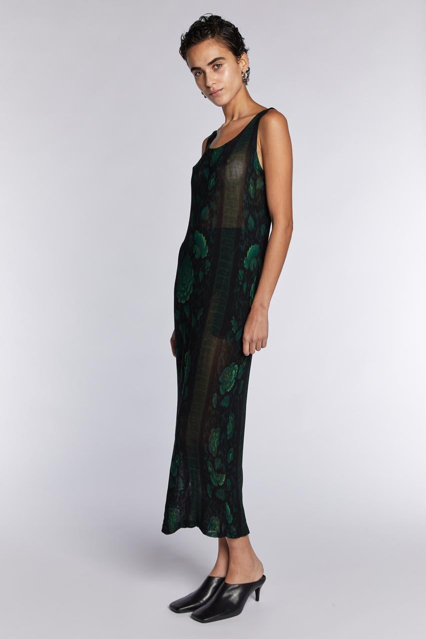 - Spring/ Summer 1996 collection by Yohji Yamamoto

- Sold by Mae Vintage London 

- Black mesh dress with a green floral pattern and pockets

- Made in Japan 

- Very good condition 
