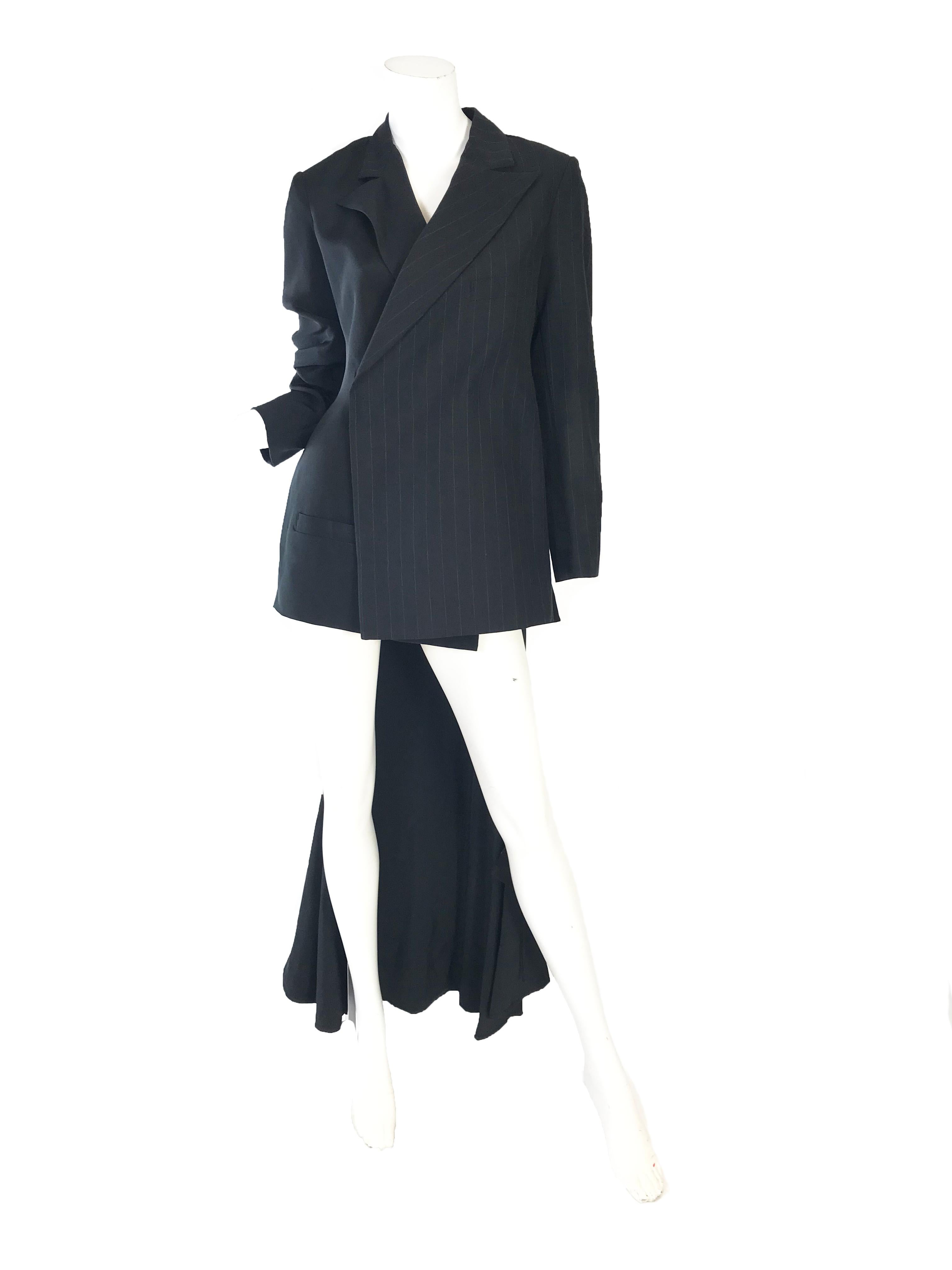1990s Yohji Yamamoto black blazer with tails with black chiffon wrap skirt.

Made in Japan
Condition: Excellent
labeled size 2 or Medium ( mannequin is a US size 6 ) 