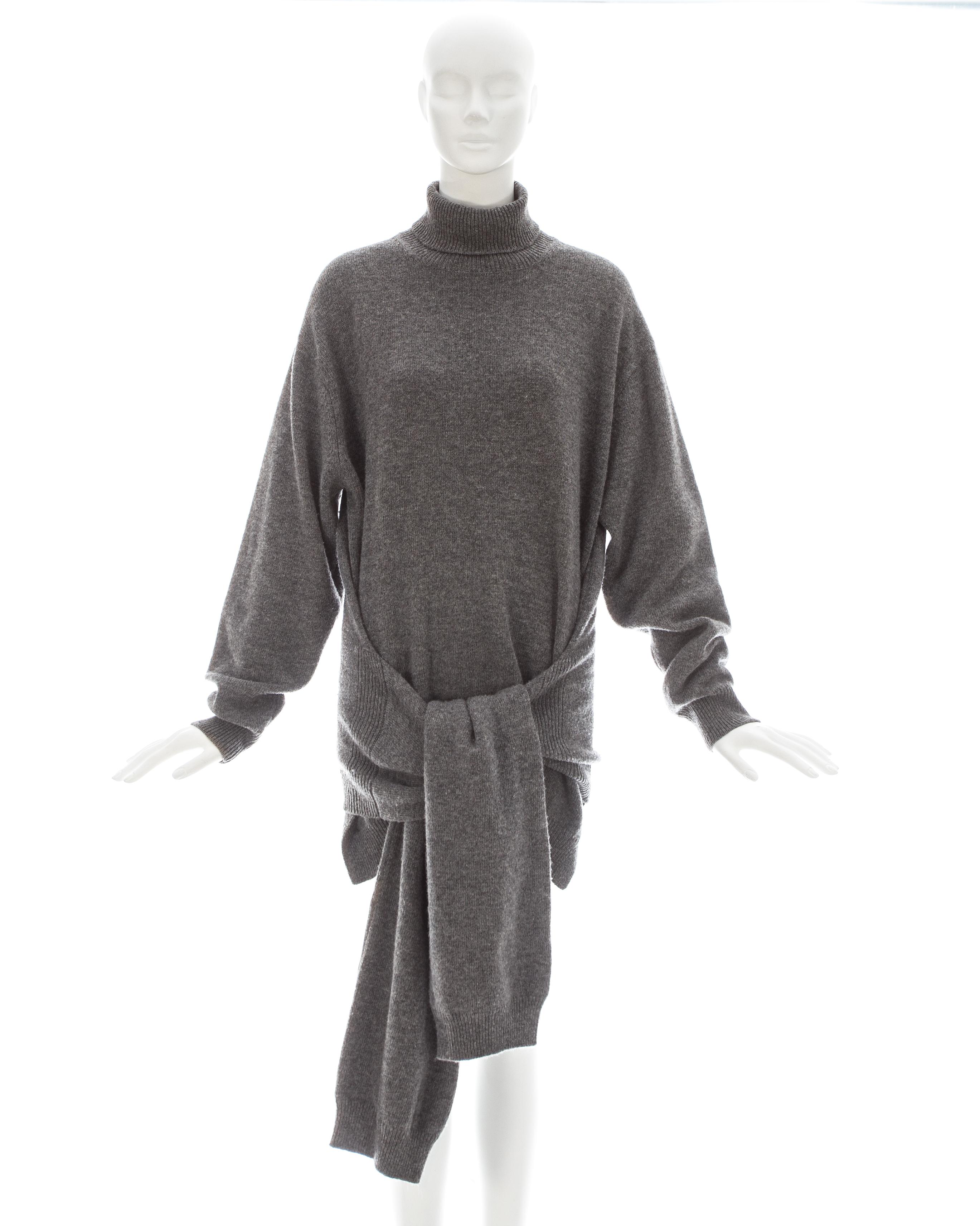 Yohji Yamamoto; Grey wool turtle neck sweater with 4 sleeves with ribbed cuffs 

Fall-Winter 1992