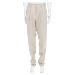 YOHJI YAMAMOTO hellbeige Hose aus Wollmischung mit konisch zulaufendem 3D-Plissee L