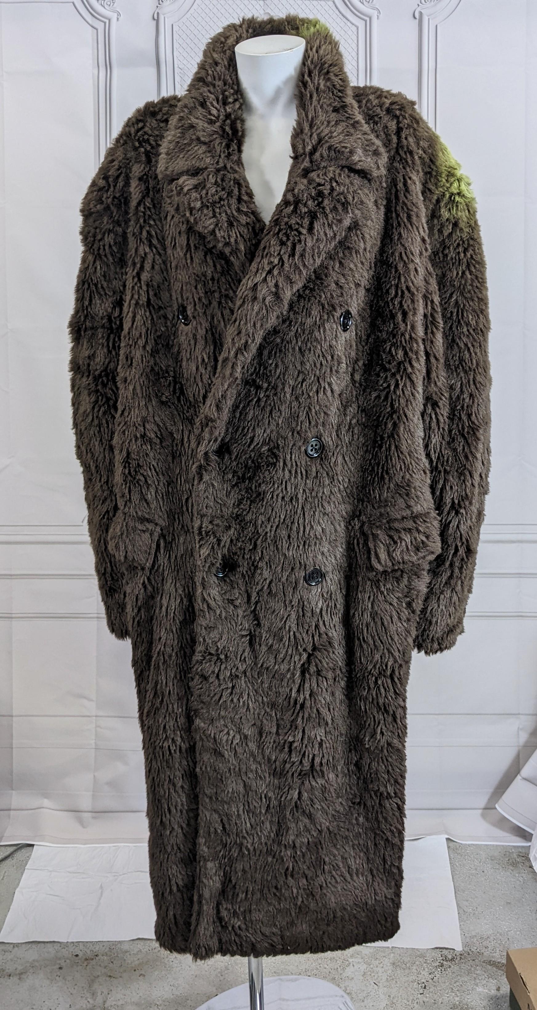 Yohji Yamamoto Mens Double Breasted Faux Fur Teddy Coat from the 1980's. Plush faux fur cut in classic mens style with the use of an unexpected fabrication. 
On the shoulder there are traces of fluorescent green spray paint from a Vogue sitting