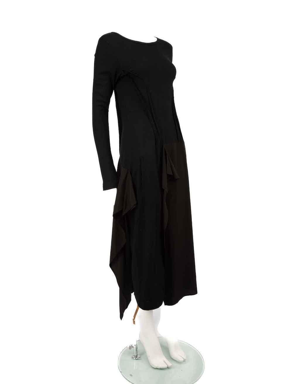 CONDITION is Very good. Minimal wear to dress is evident. Minimal pull thread to front and back of skirt on this used Michiko by Y's designer resale item.
 
 
 
 Details
 
 
 Black
 
 Wool
 
 Dress
 
 Midi
 
 Long sleeves
 
 Synthetic ruffle skirt
