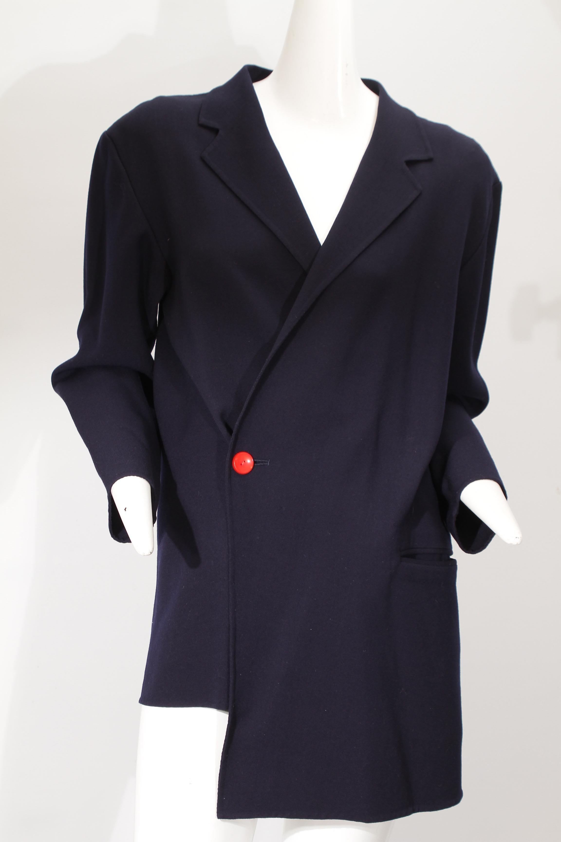 YOHJI YAMAMOTO, navy, single red-button, asymmetrical, wool blazer from Private Collector who was a Pace Gallerist in the 80s.

Size Medium

In excellent condition.