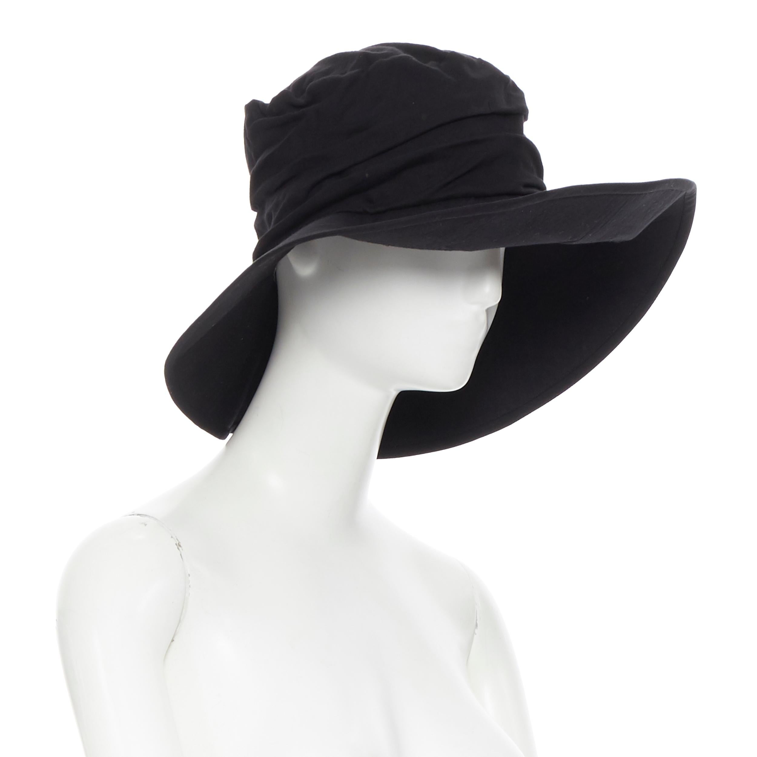 YOHJI YAMAMOTO NOIR black tencil wide brim pleated fedora hat
Brand: Yohji Yamamoto Noir
Designer: Yohji Yamamoto
Model Name / Style: Fedora
Material: Other; tencil
Color: Black
Pattern: Solid
Extra Detail: Wide brim. Pleated soft upper.
Made in: