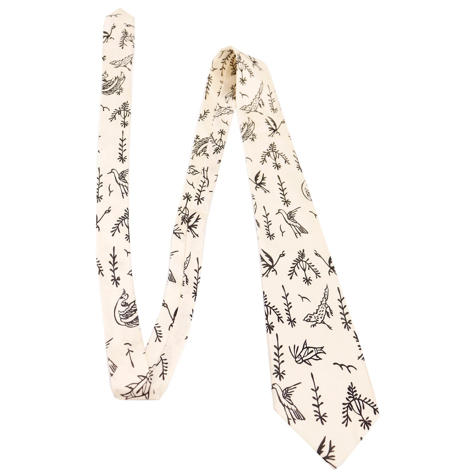 This Yohji Yamamoto silk tie is from a collector's estate of vintage and contemporary Yohji Yamamoto and Comme des Garcon ties. This one is one of our all time favorites! We have never seen one like this and we love the unique design. The tie is in