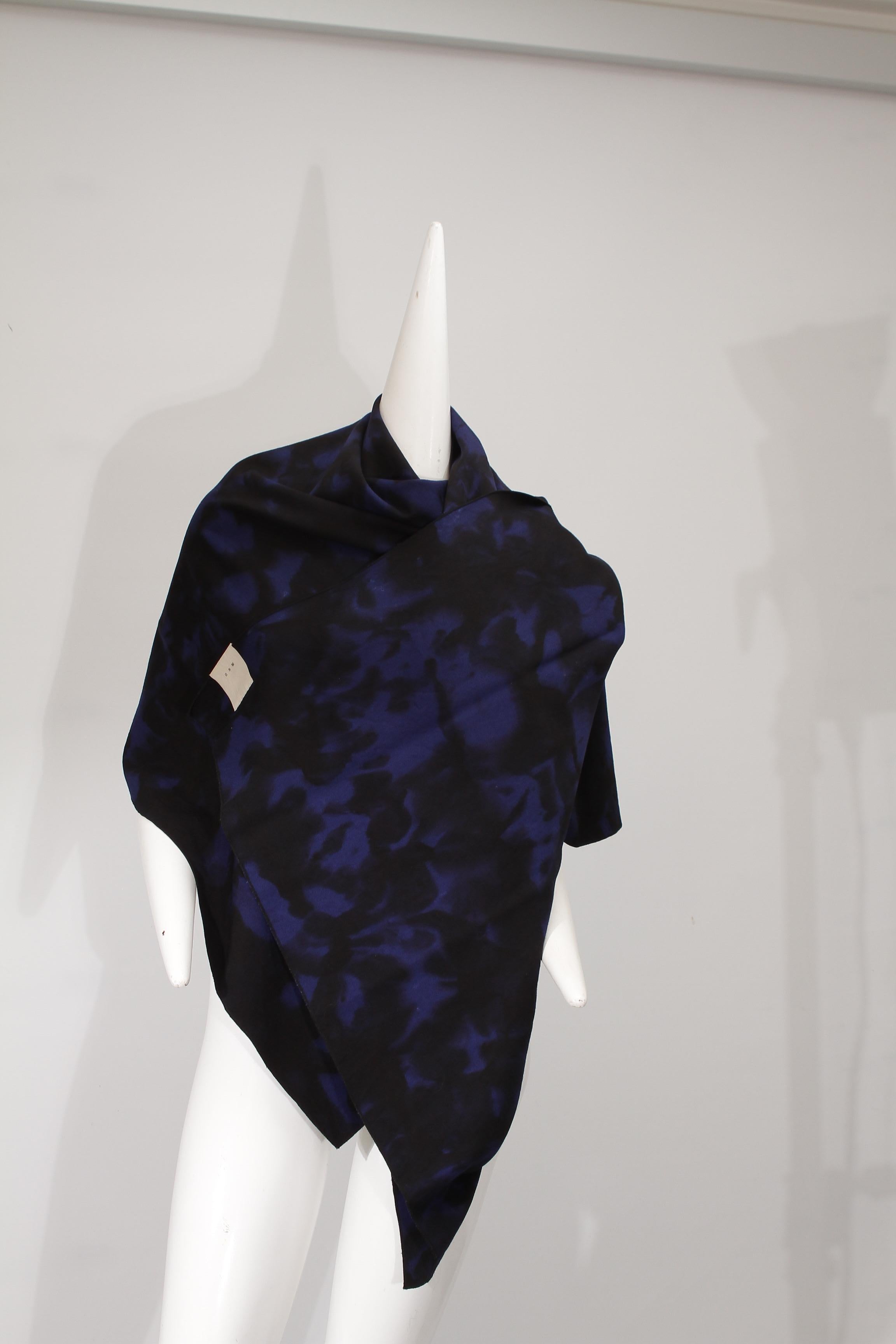 YOHJI YAMAMOTO, Shibori dyed oversize wool shawl, midnight blue and black, circa 1980s.

Light wool, oversized body wrap in excellent condition. Private collector was a gallerist at Pace and acquired several Japanese designer pieces from the 80s. 