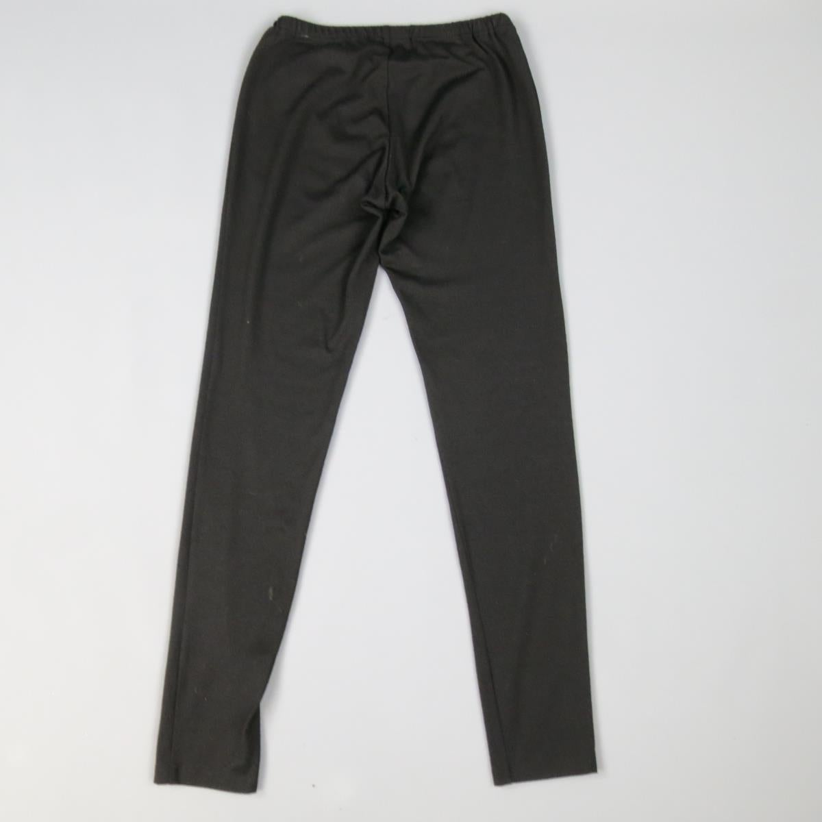 YOHJI YAMAMOTO black wool/polyester blend leggings feature an elastic waistband and stretch throughout. Made in Japan. 
Good Pre-Owned Condition. 
 

Measurements: 
  
l	Waist: 26 In.
l	Rise: 9 In.
l	Length: 37.5 In.

  
  
  
 
Reference:
