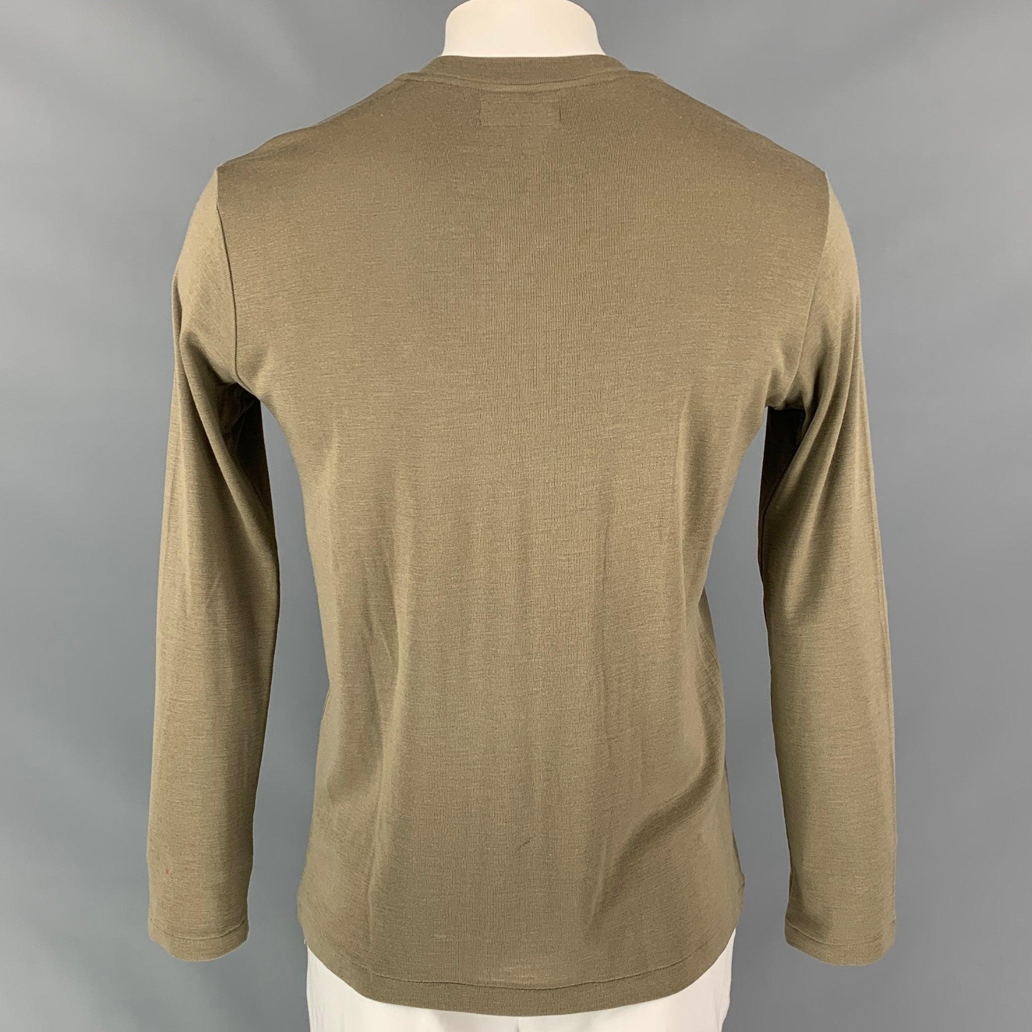 YOHJI YAMAMOTO pullover comes in a sage wool / cashmere featuring a v-neck. Made in Japan.Very Good
 Pre-Owned Condition. 
 

 Marked:  3 
 

 Measurements: 
  
 Shoulder: 19 inches Chest: 43 inches Sleeve: 26.5 inches Length: 28 inches 
  
  
  
