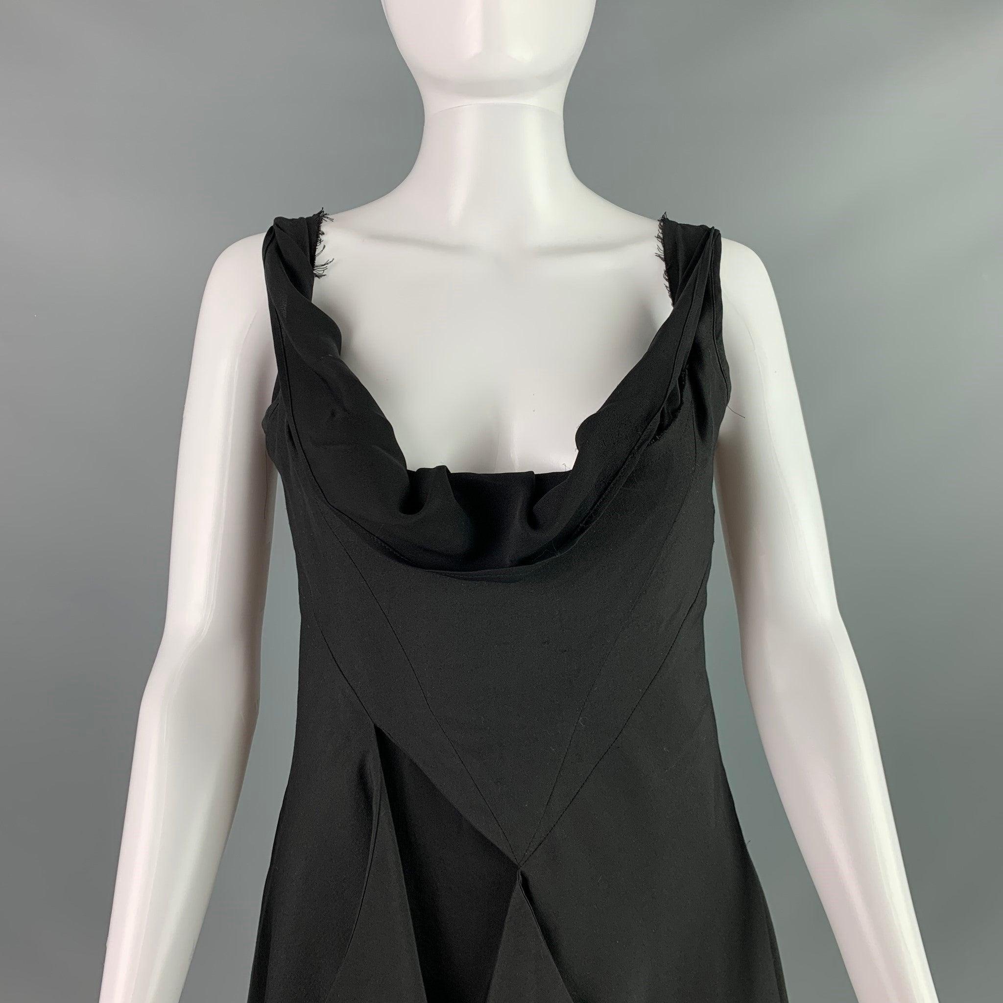 YOHJI YAMAMOTO sleeveless asymmetrical dress comes in a black silk woven material featuring layered aesthetic, draped neckline, and zip up closure at back. Made in Japan.Excellent Pre-Owned Condition. 

Marked:  1 

Measurements: 
 
Shoulder: 12.5