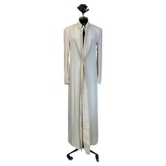 YOHJI YAMAMOTO Ivory-colored felt and wool overcoat from the early 2000s.