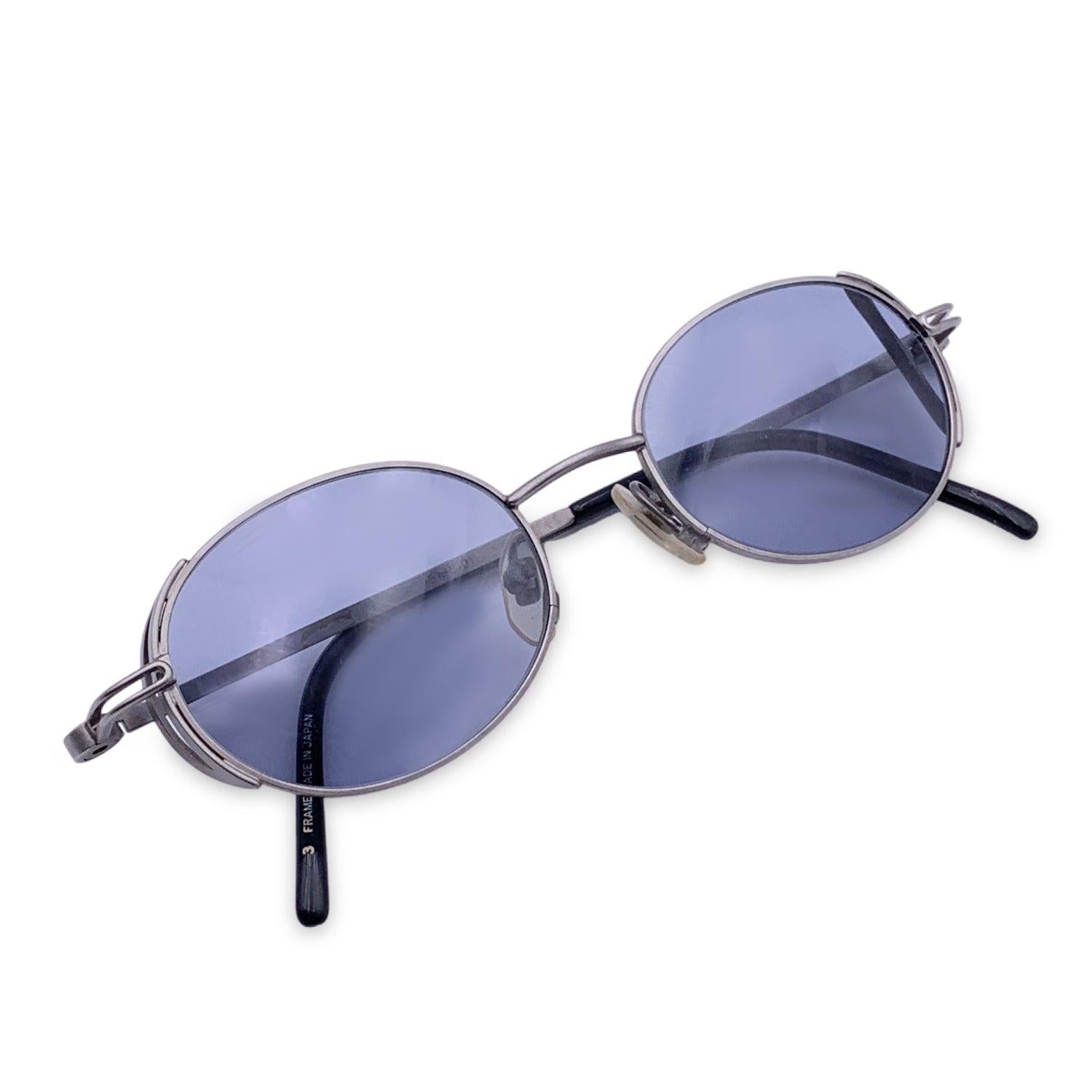 Vintage Yohji Yamamoto Grey Metal sunglasses. Model: 51-5101 Size: 48/19 138mm. Grey metal frame and temples, with black acetate on the finish. 100% Total UVA/UVB protection. Gradient Blue lenses. Details MATERIAL: Metal COLOR: Grey MODEL: 51-5101