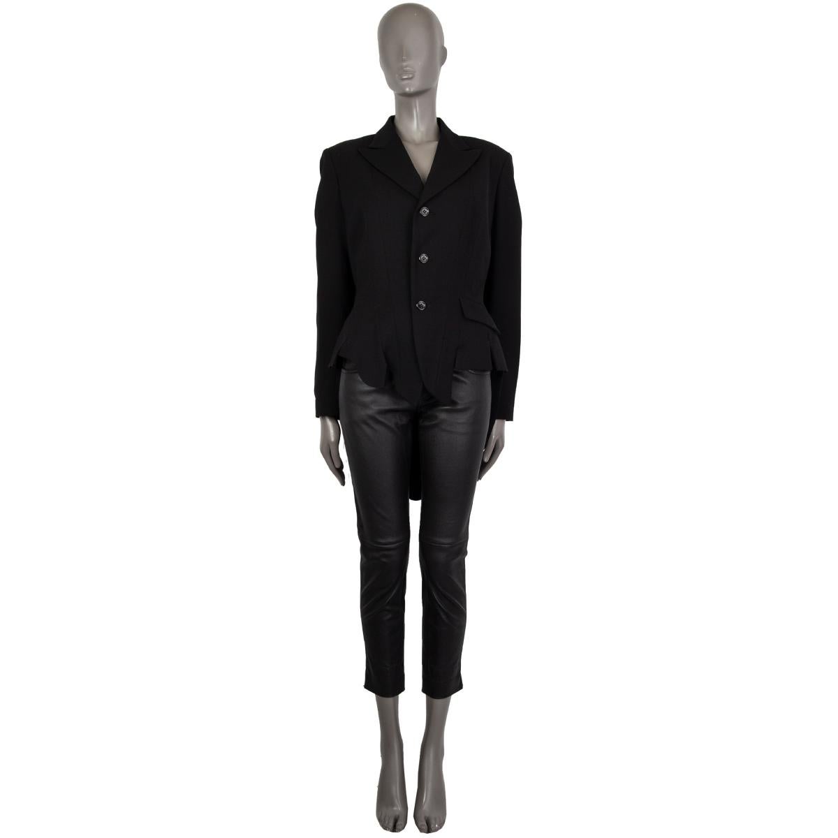 100% authentic Yohji Yamamoto fantasy hemline blazer in black virgin wool (100%) with a peak collar. Has one deocarative flap pocket on the front. Closes on the front with buttons. Lined in cupro (100%). Has been worn and is in excellent condition.