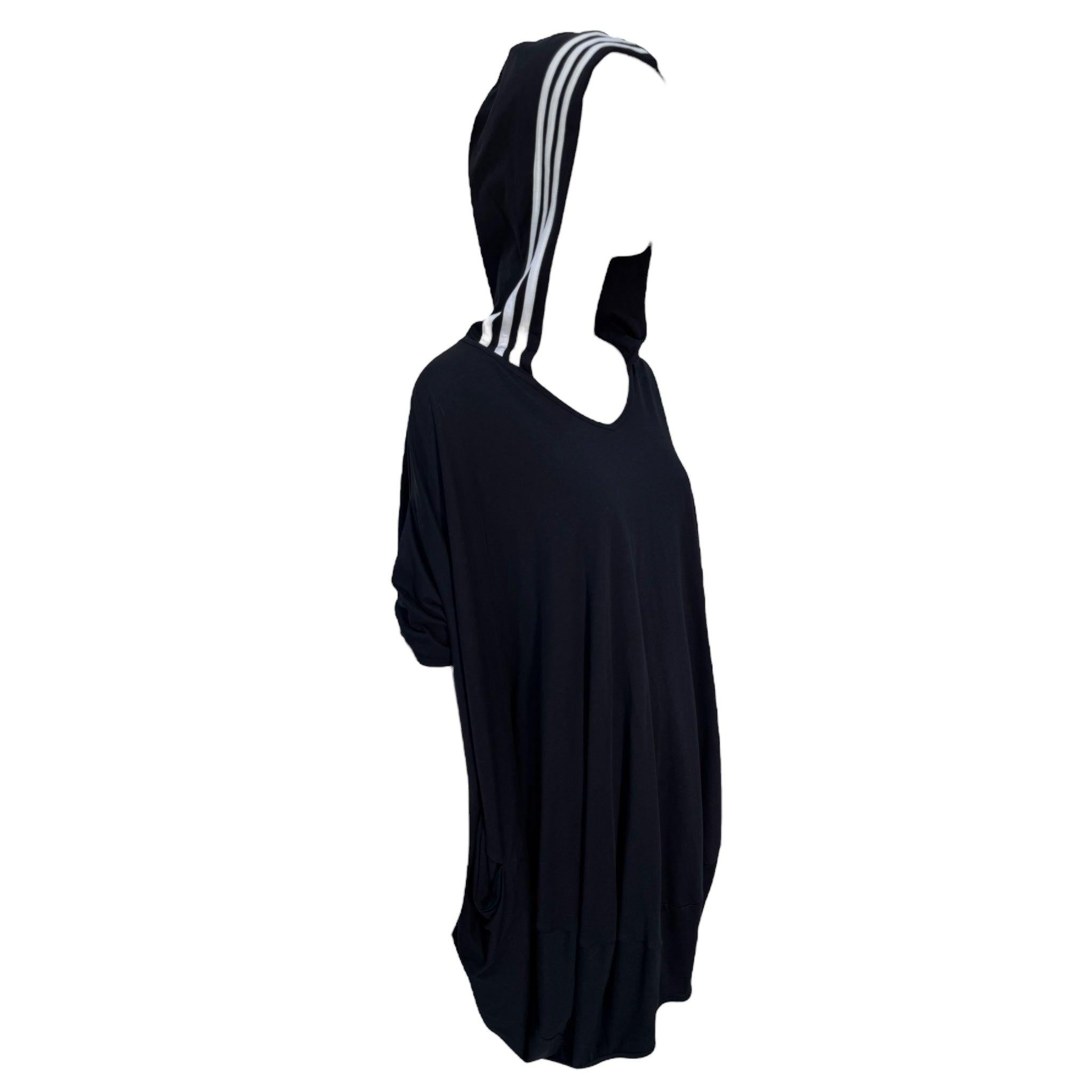 Japanese master-tailor Yohji Yamamoto's collaboration with Adidas blended engaging form with active-wear. Y-3 debuted in 2003. This black bubble dress can be worn as an oversized tee or a dress, making it unisex and flexible to many styles. 100%