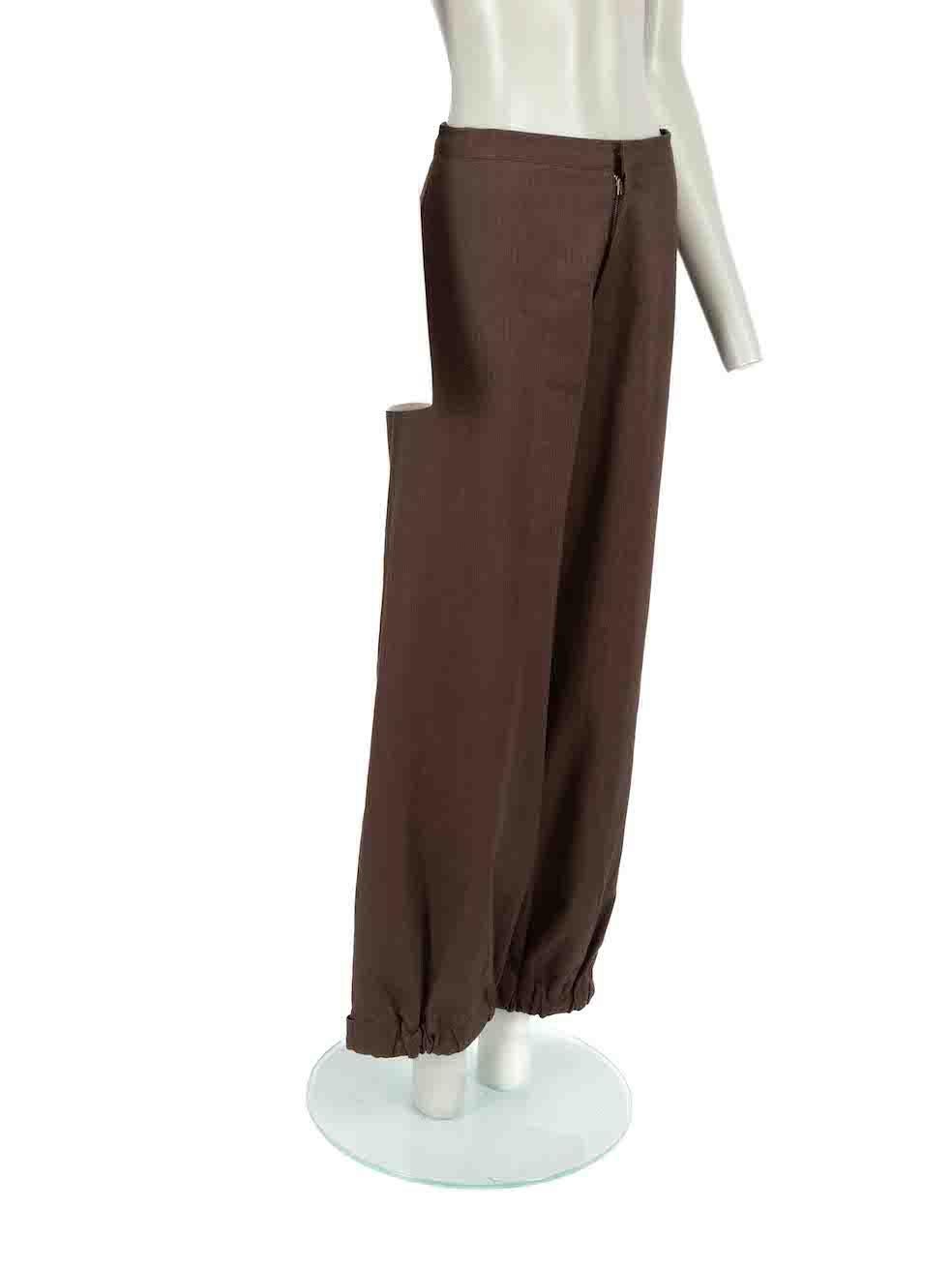 CONDITION is Very good. Hardly any visible wear to trousers is evident on this used Y's Yohji Yamamoto designer resale item.
 
Details
Brown
Cotton
Tapered parachute trousers
Herringbone pattern
Mid rise
Gathered and velcro strap cuffs
Front zip
