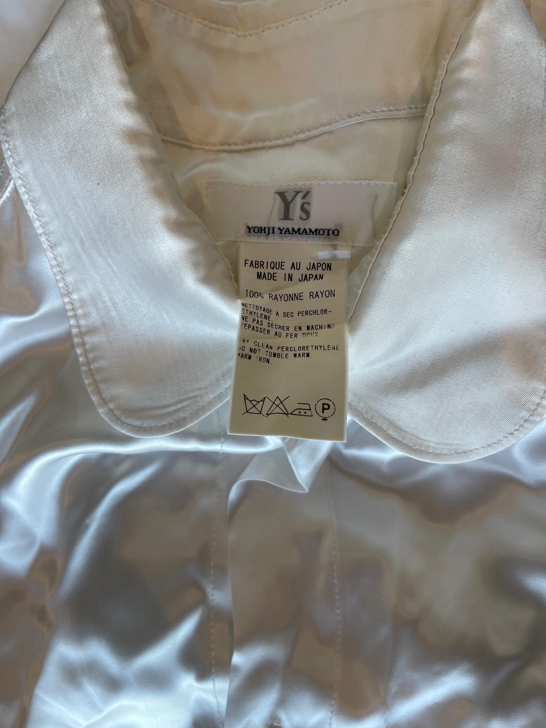 YOHJI YAMAMOTO Y’s Spring 2004 Runway white rayon asymmetrical oversized shirt ! Features buttons up the front with drawstrings on each side of the front. Can be worn a number of ways.
In great unworn condition
Made in Japan
Marked Size 4 ( Extra