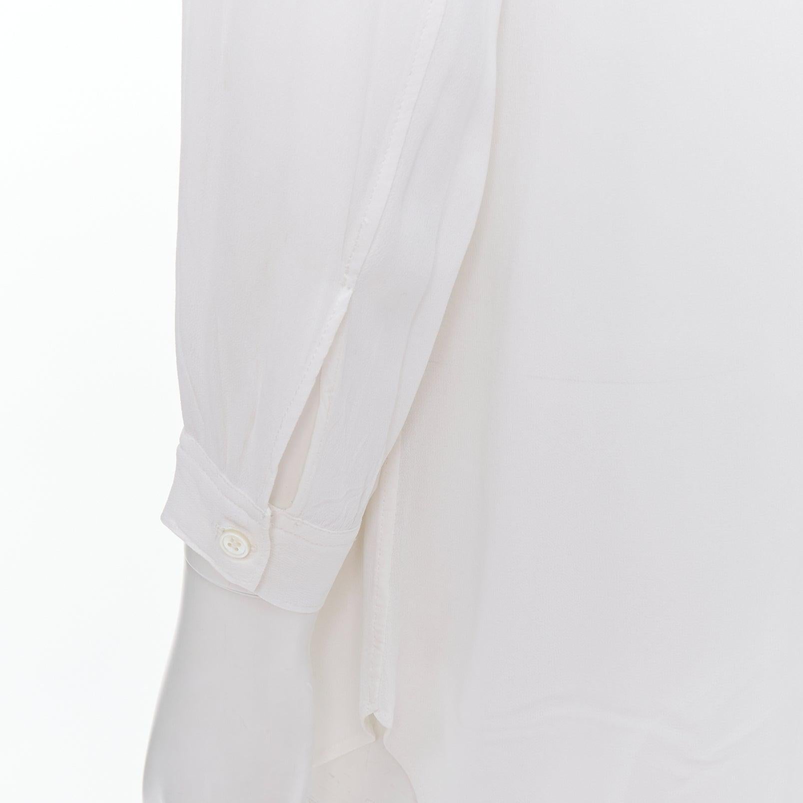Yohji Yamamoto Y's camicia bianca in seta con manica a giro M
Riferimento: PRWU/A00069
Marchio: Yohji Yamamoto
Collection's: Y's
Materiale: Rayon
Colore: bianco
Modello: Tinta unita
Chiusura: bottone
Prodotto in: Giappone

CONDIZIONE:
Condizioni: