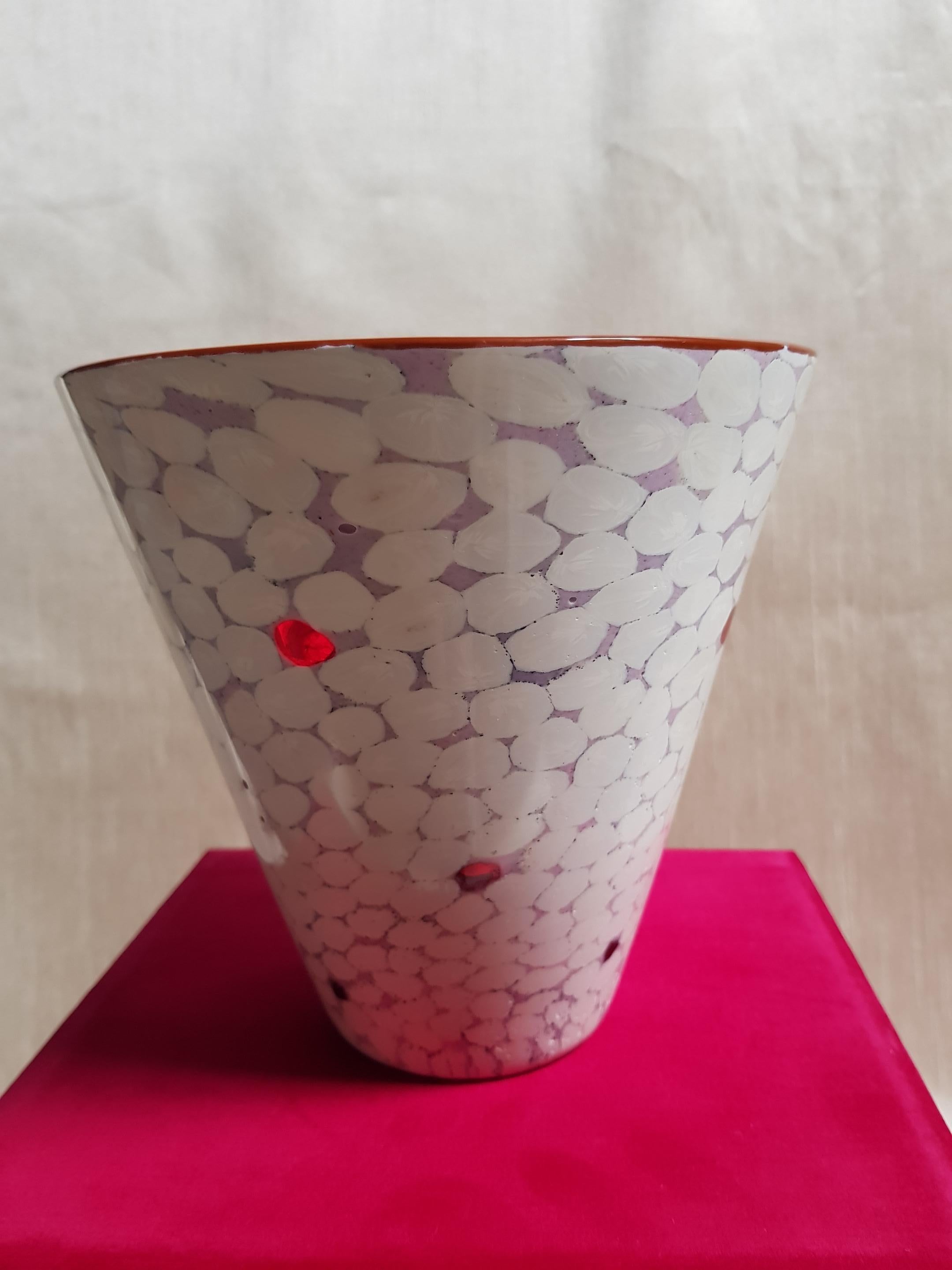 A rare and exquisite example of Yoichi Ohira's finest works, an art glass vase handcrafted on the venetian island of murano. Blown glass canes with mirrune and powder inserts, polished and ground surface.
Executed by Livio Serena, master