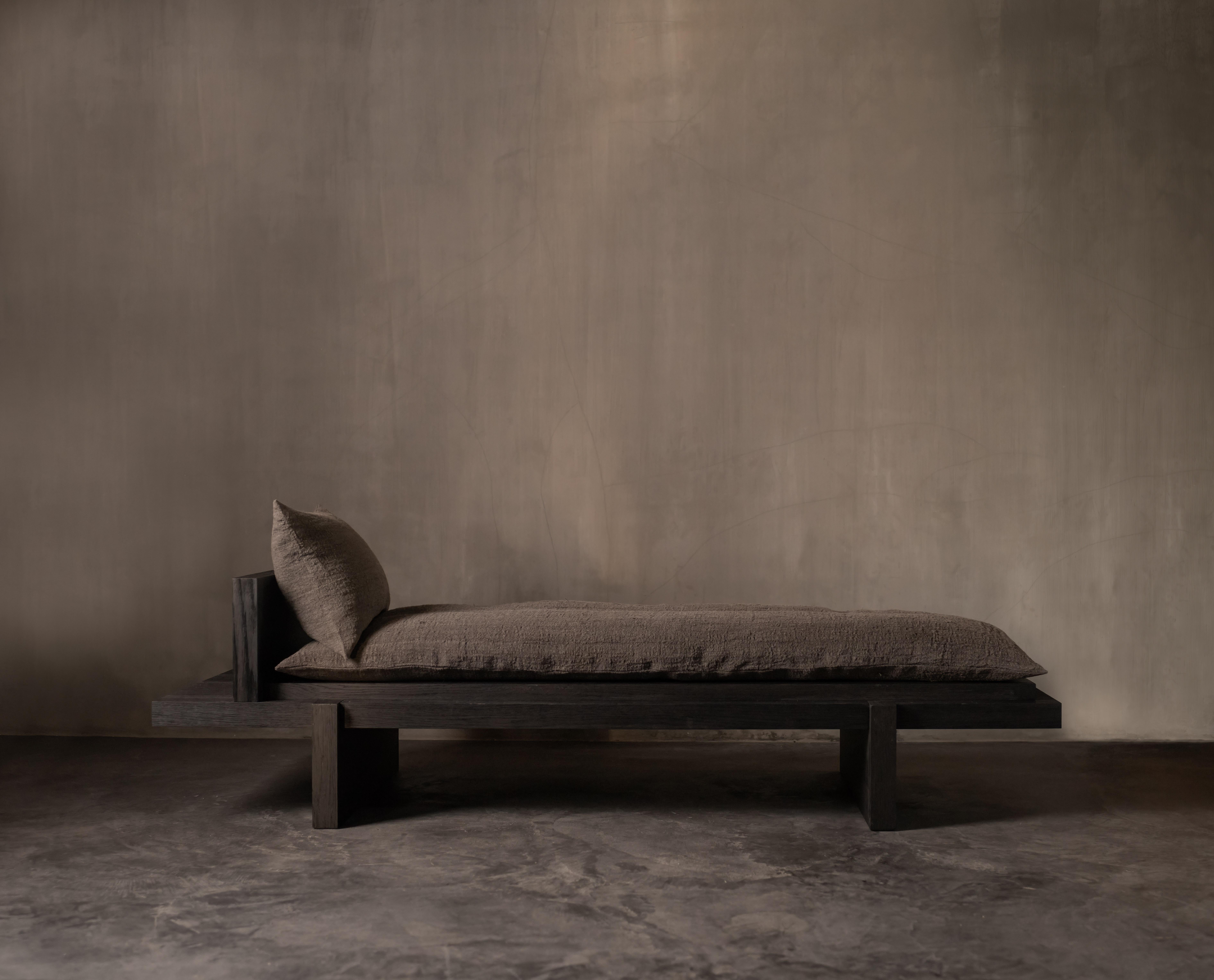 Yoishu Daybed by Kana objects.
Dimensions: D 80 x W 220 x H 35 cm.
Materials: smoked oak, vintage hemp fabric.
Also available in natural oak and swamp oak.
Available in different fabrics.

Japanese Daybed

The Yoishu series represents a