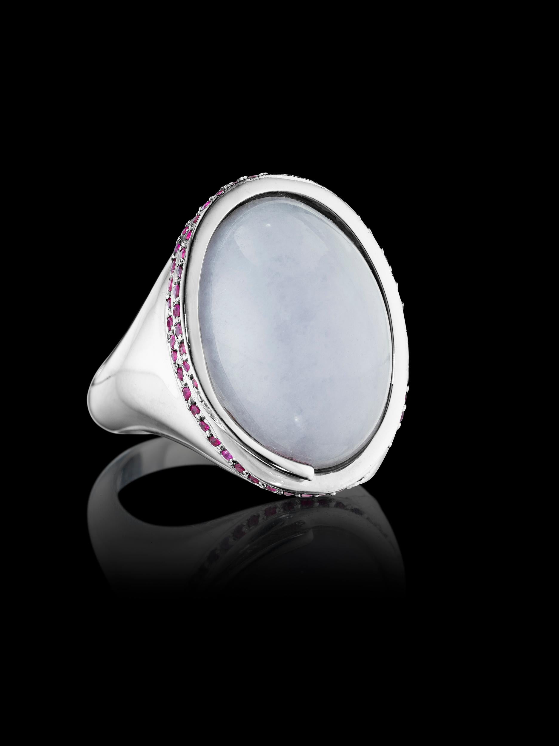 Ring features Lavender Jade and Rubies, creating an enchanting elegance from Pure Life Collection, inspired by a ballerina dancing gracefully effortlessly. Ring is set in 18k white gold. 

Size 7.5 

Center stone:  18x14x6.5mm, 14.61 ct.