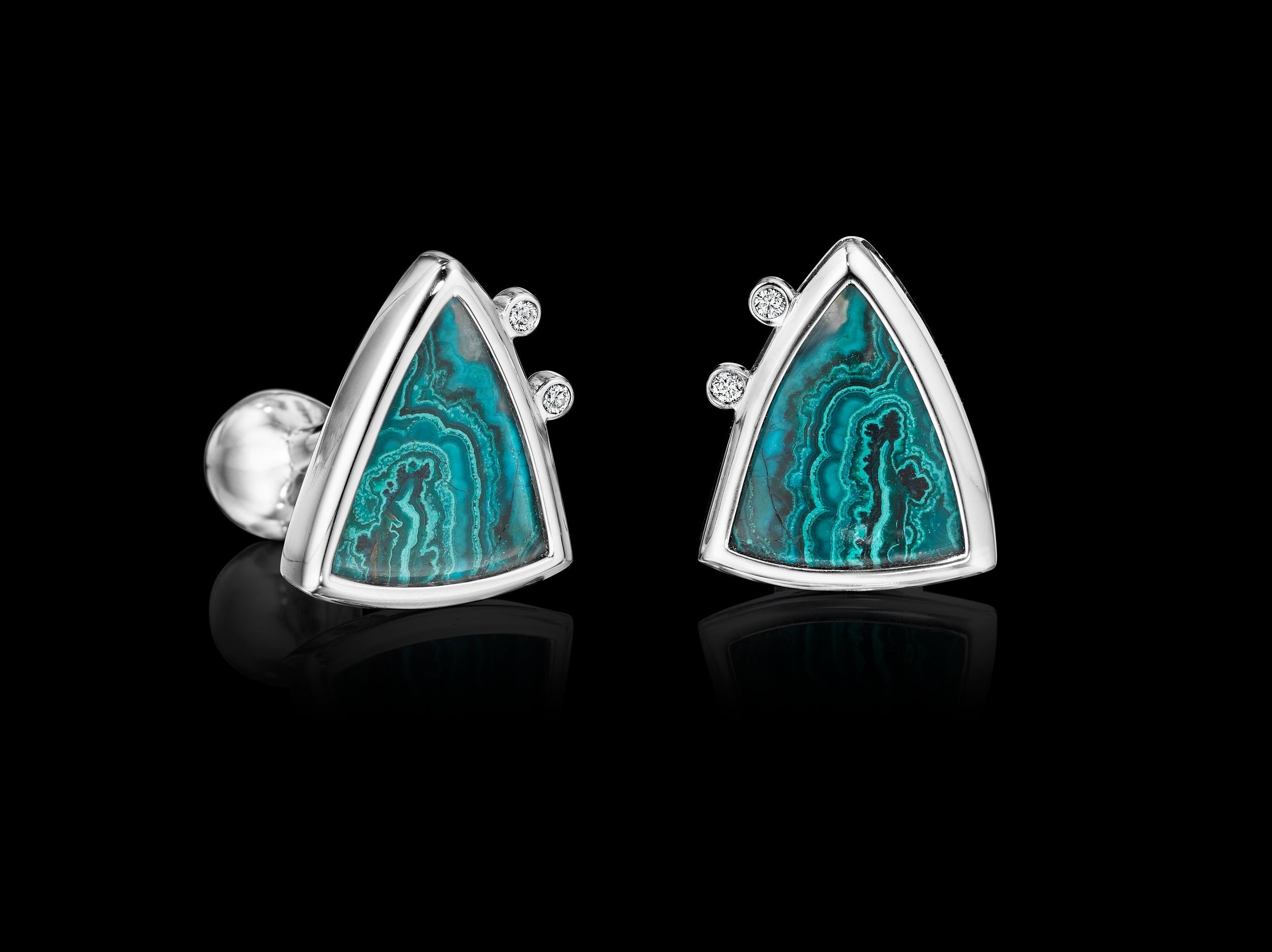 One-of-a-kind Platinum Cufflinks YOKI design, features Diamond (0.1cts. approx.) and Azurite Malachite (27.5cts approx.) set in Platinum. 

Dimensions: 2.1mm face length x 1.7mm face width (approximately)

Style: Cufflinks: Ball return back

This