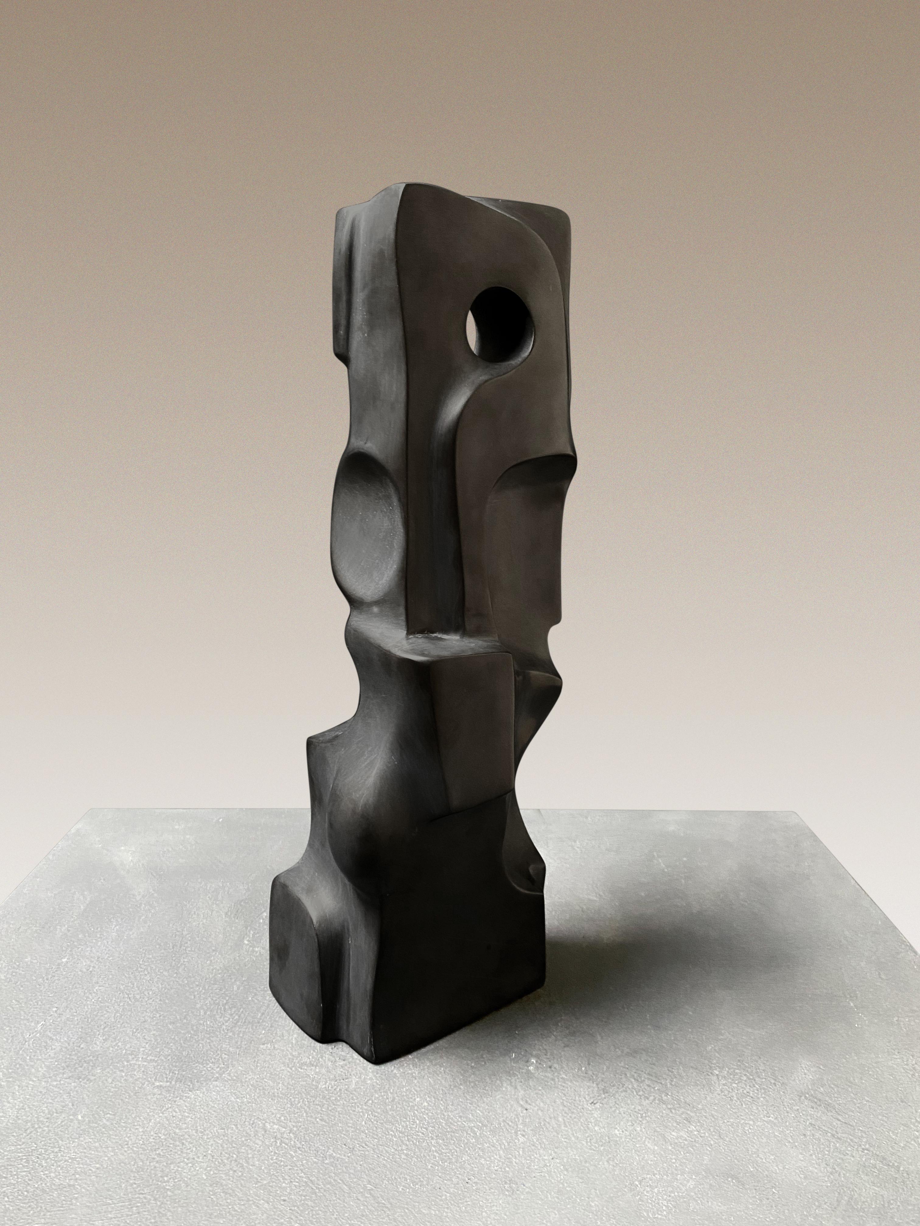 Citadel, Black Belgian Marble, 2021 by Yoko Kubrick.
Geometric and organic flowing lines, carved into a marble block with a matte finish. 

Kubrick’s work uses abstracted natural forms—the curve of a petal, the undulations of the sea, the ridge of a