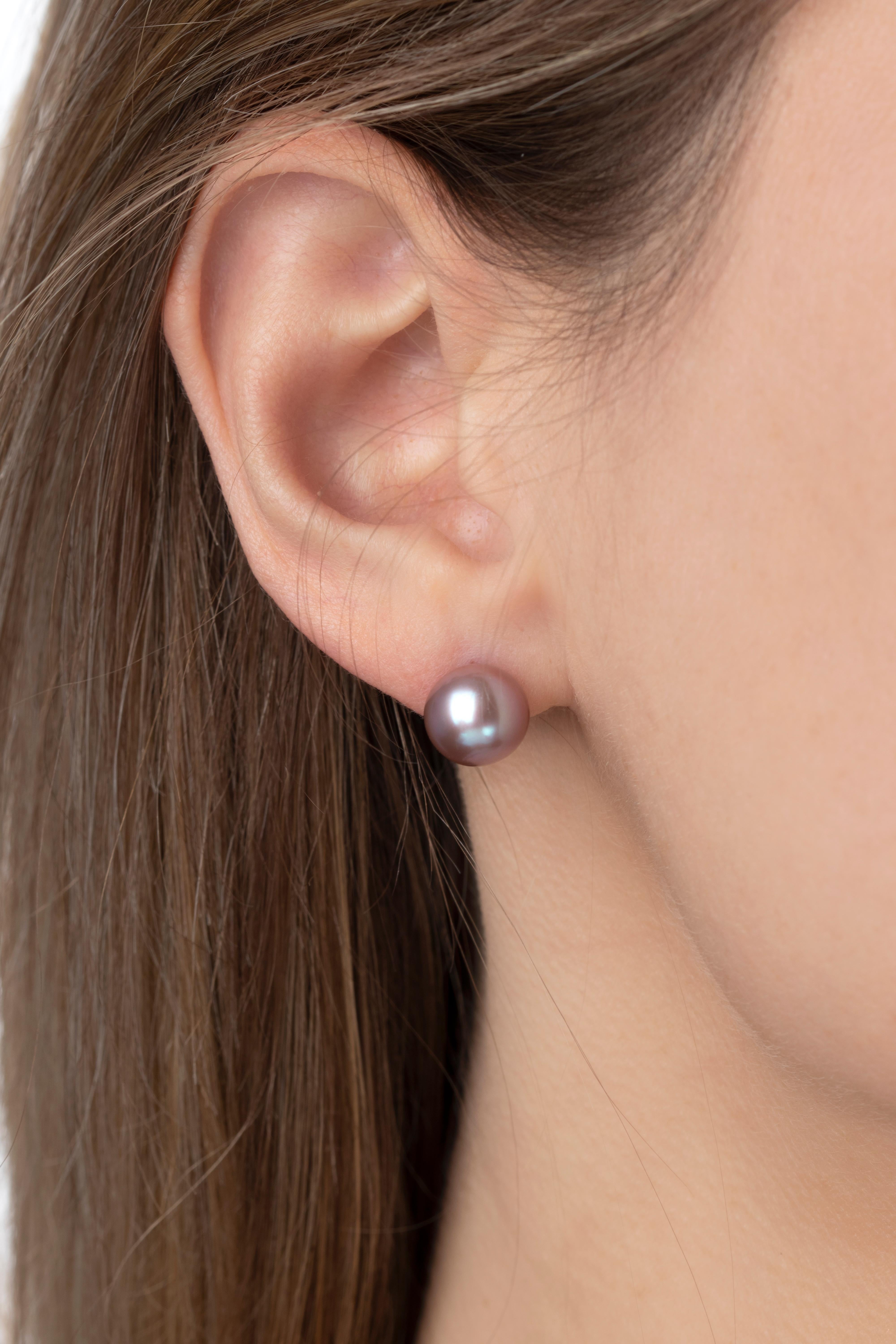 These classic studs by Yoko London feature two perfectly matched natural coloured freshwater pearls which have been selected by experts for their superior surface quality and lustre. Elegant in any context, these timeless studs will add a playful