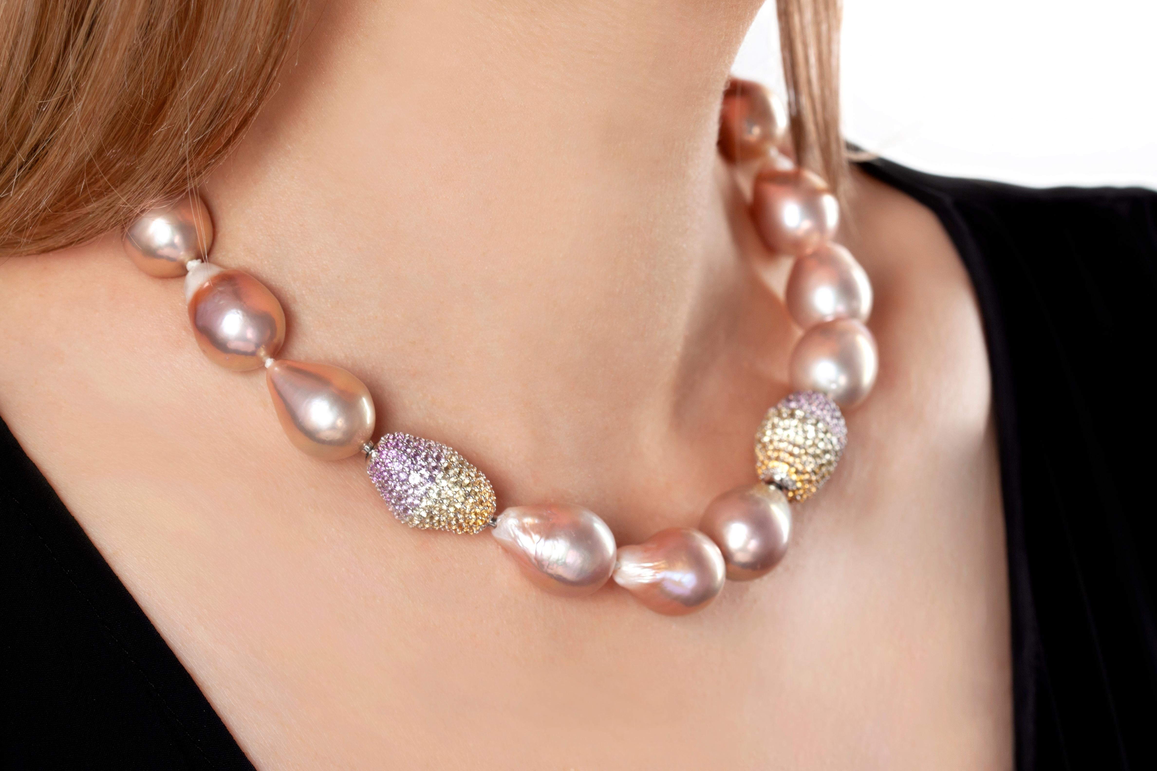 This mesmeric necklace by Yoko London features sumptuous pink baroque pearls in rare sizes. Each baroque pearl is completely unique and this design perfectly highlights their allure and mystique. The rich, pink hues of the pearls are perfectly