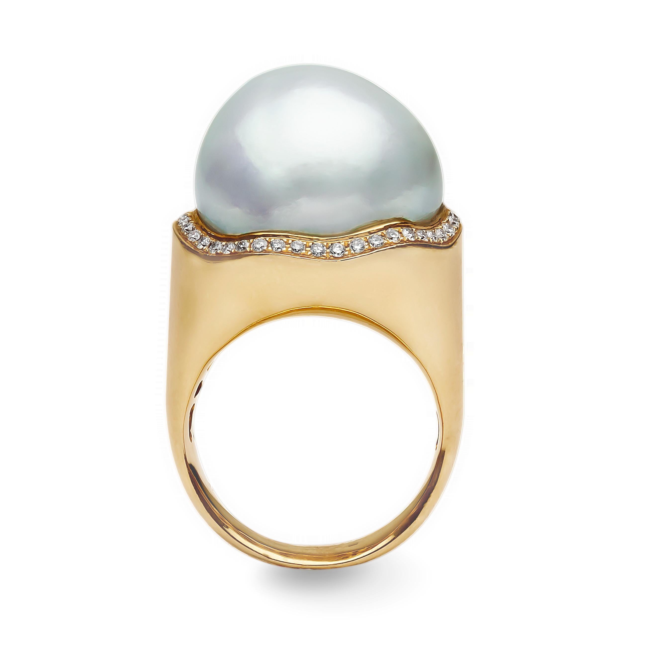 This exceptional ring by Yoko London features an alluring Baroque South Sea Pearl as it's focal point, which has been hand selected by our experts. Surrounded by a swirl of diamonds, and encased in a bold 18 Karat Yellow Gold setting, the ring has
