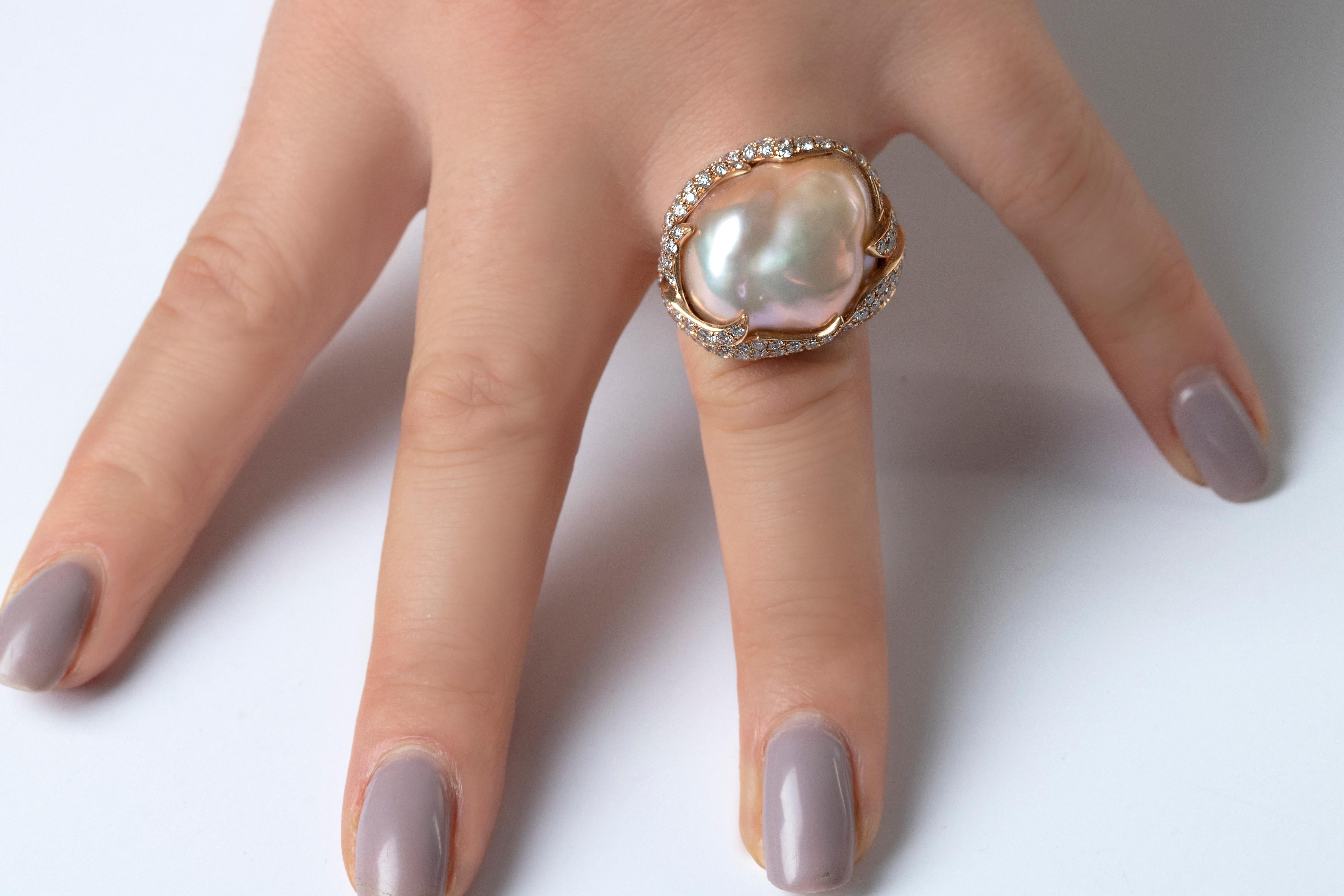 This unique ring by Yoko London features a spectacular 17-18mm Baroque pearl in the centre of a striking diamond ring. As each baroque pearl is completely one-of-a-kind, each setting has to be crafted to perfectly showcase the unique allure and
