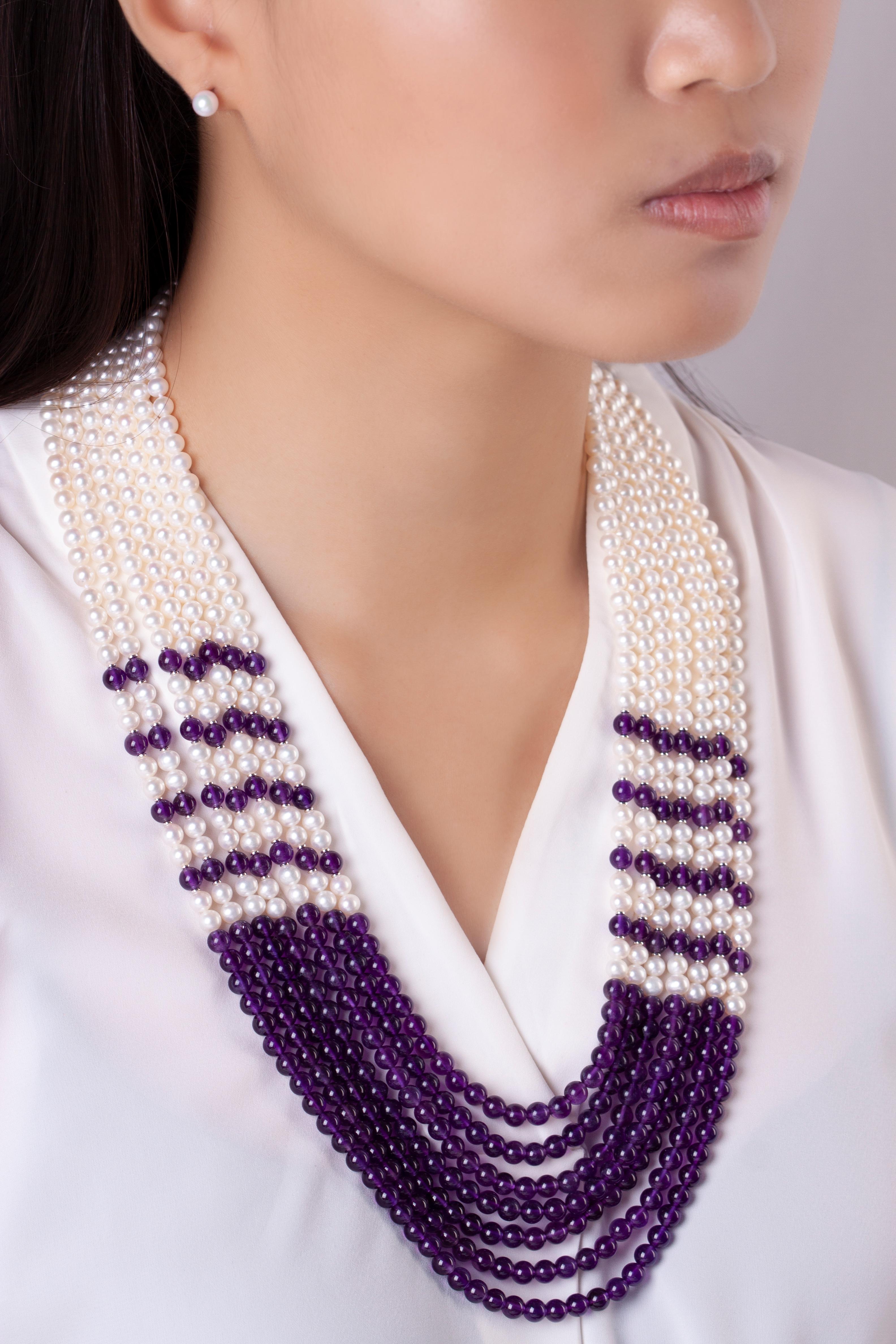 This unique seven row Freshwater pearl and amethyst necklace by Yoko London is simultaneously striking and elegant. Expertly hand crafted in our London atelier, this spectacular necklace will add a sumptuous pop of colour to any outfit. 
-	5-5.5mm