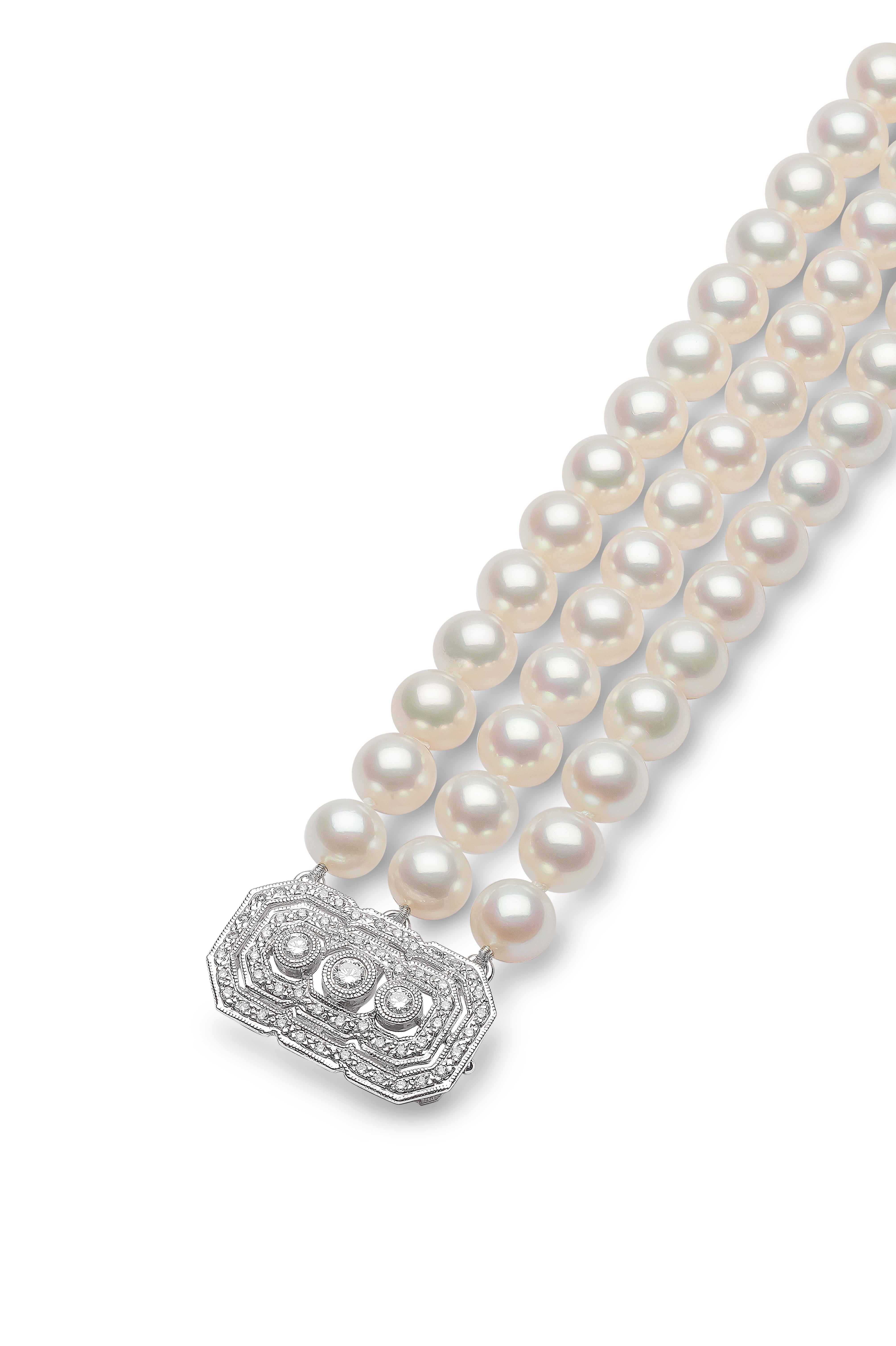 This elegant pearl choker by Yoko London features three rows of lustrous 7.5-8mm Freshwater pearls and an ornate diamond clasp. The diamond clasp is designed to be worn at the front of the neck to add a touch of sparkle to a formal look. Hand