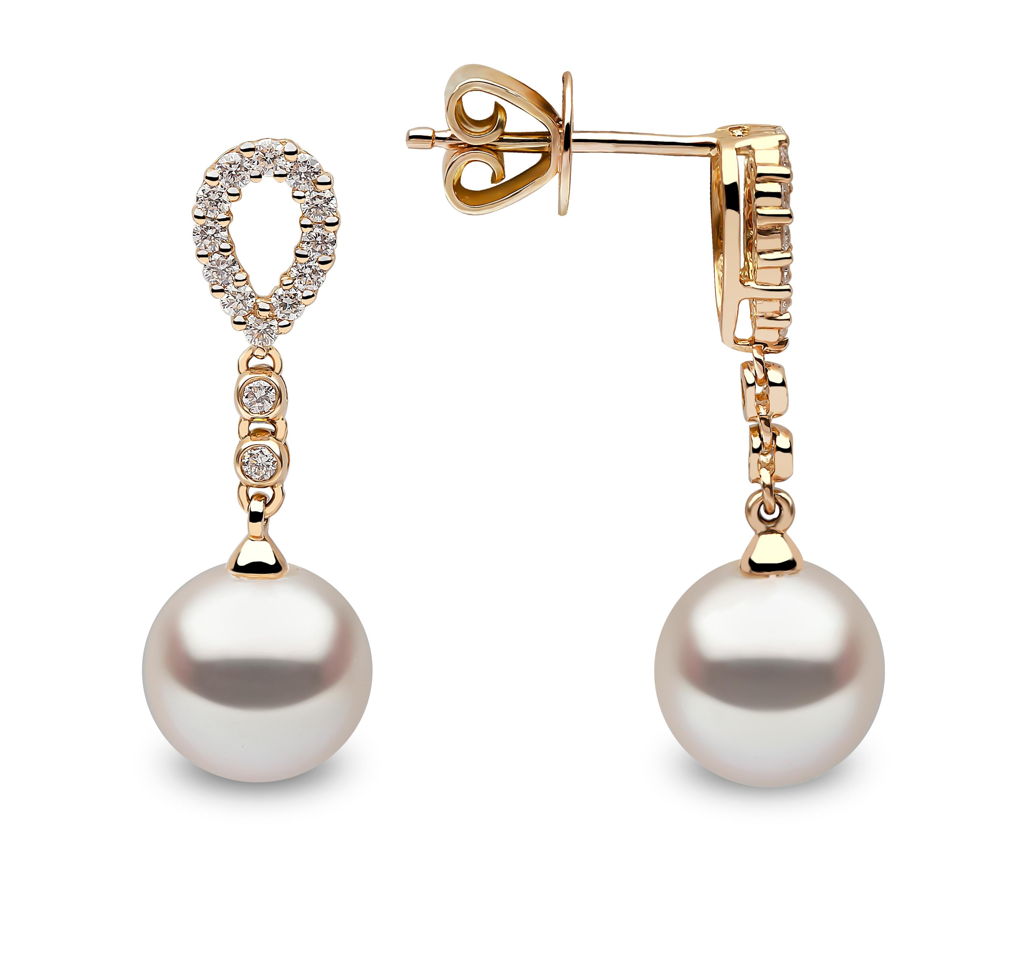 These delicate earrings by Yoko London features lustrous Freshwater pearls beneath an elegant arrangement of diamonds. The 18 Karat Yellow Gold setting perfectly enriches the white colour of the diamonds and the lustre of the pearls. These graceful