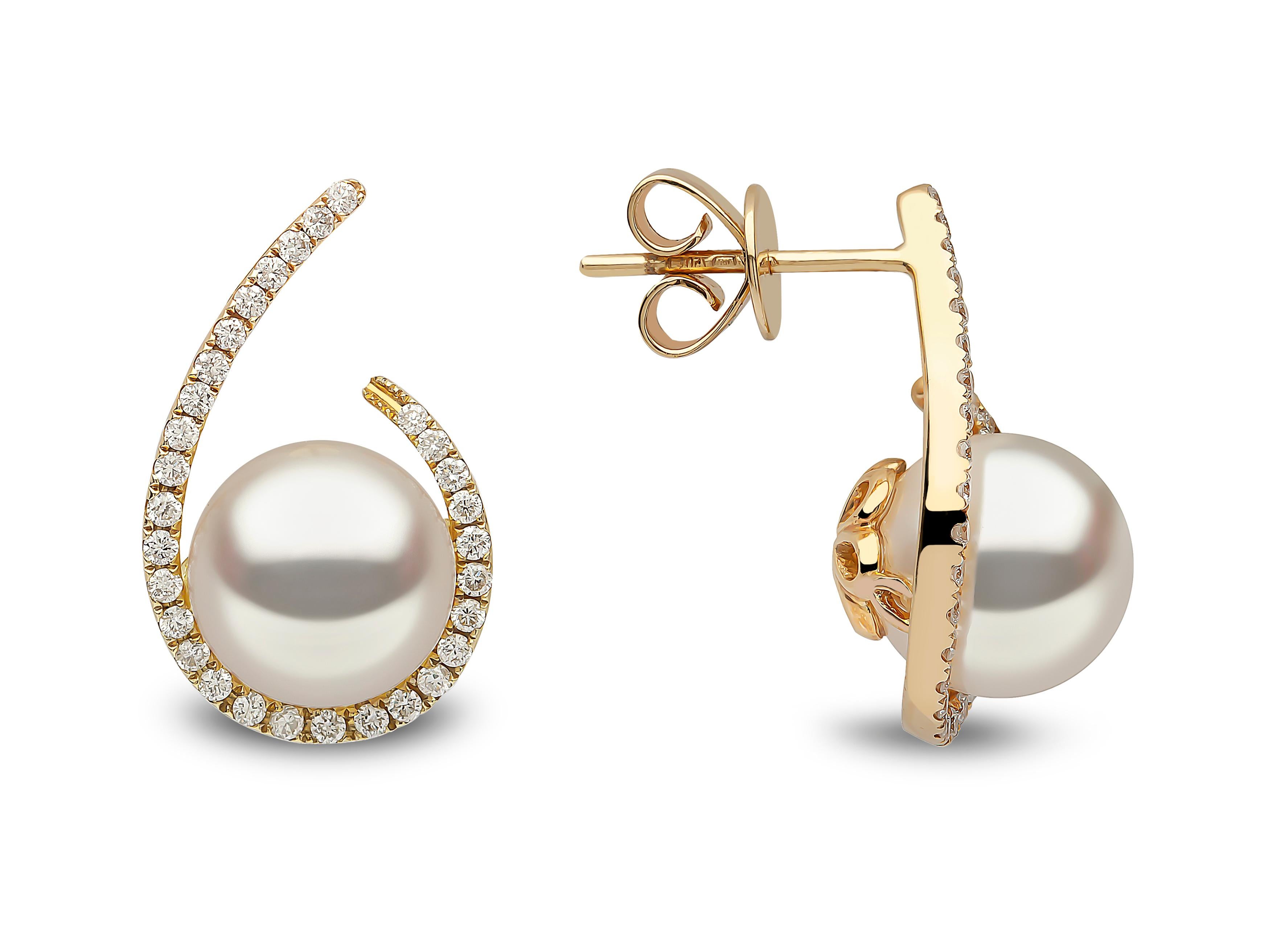 These contemporary earrings by Yoko London feature lustrous Freshwater pearls surrounded by a scintillating swirl of diamonds. Designed and hand finished in our London atelier, the pearls featured in these earrings have been expertly selected