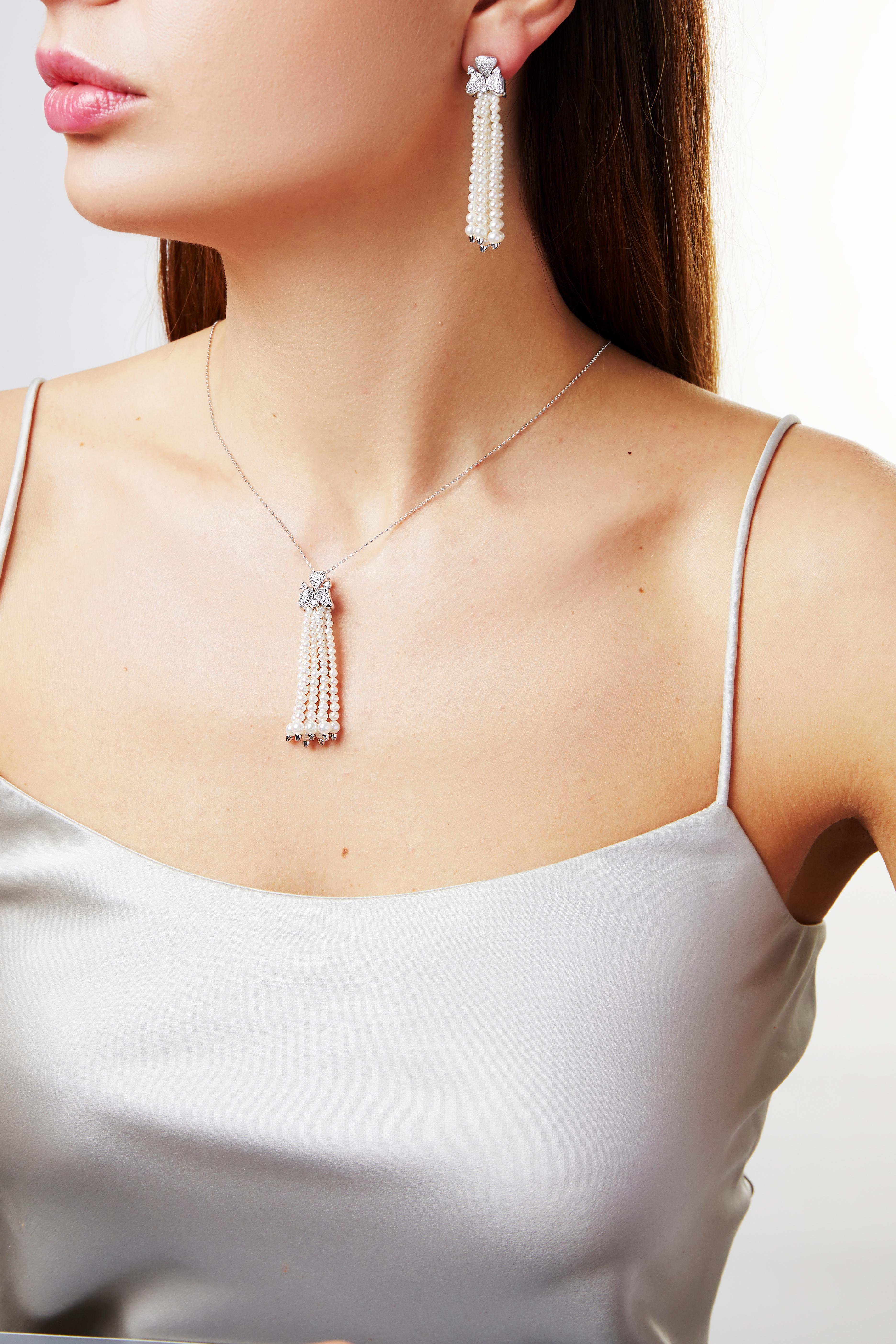 This elegant pendant by Yoko London features a fluid Freshwater pearl tassel, beneath intricate diamond flowers. Set in 18 Karat white gold, this unique pendant will make quite the statement each and everytime it is worn, especially when paired