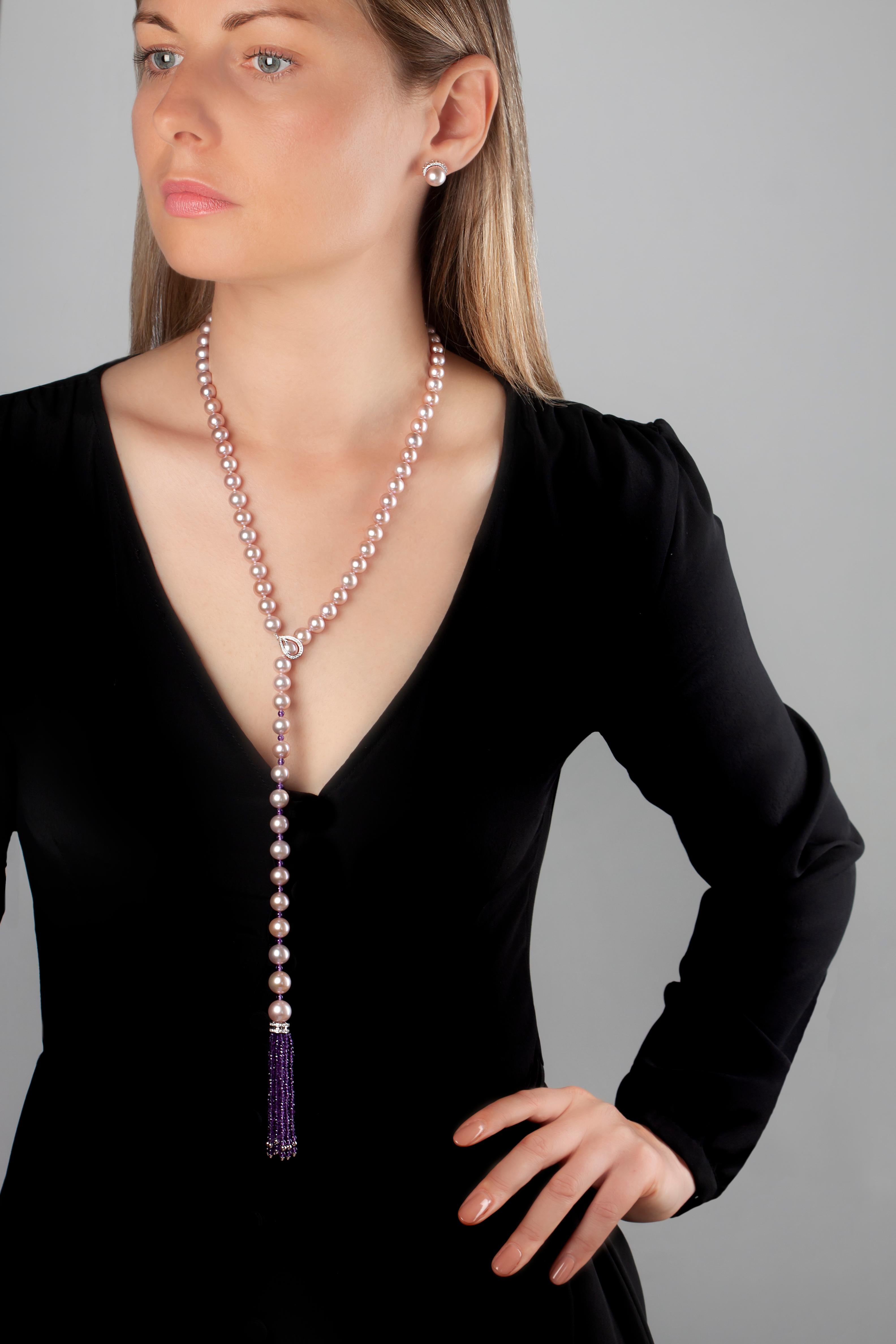 This unique lariat-style necklace by Yoko London features a row pastel pink Freshwater pearls culminating in an alluring amethyst tassel. The diamond clasp can be fastened at different points allowing the necklace to be manipulated to suit multiple