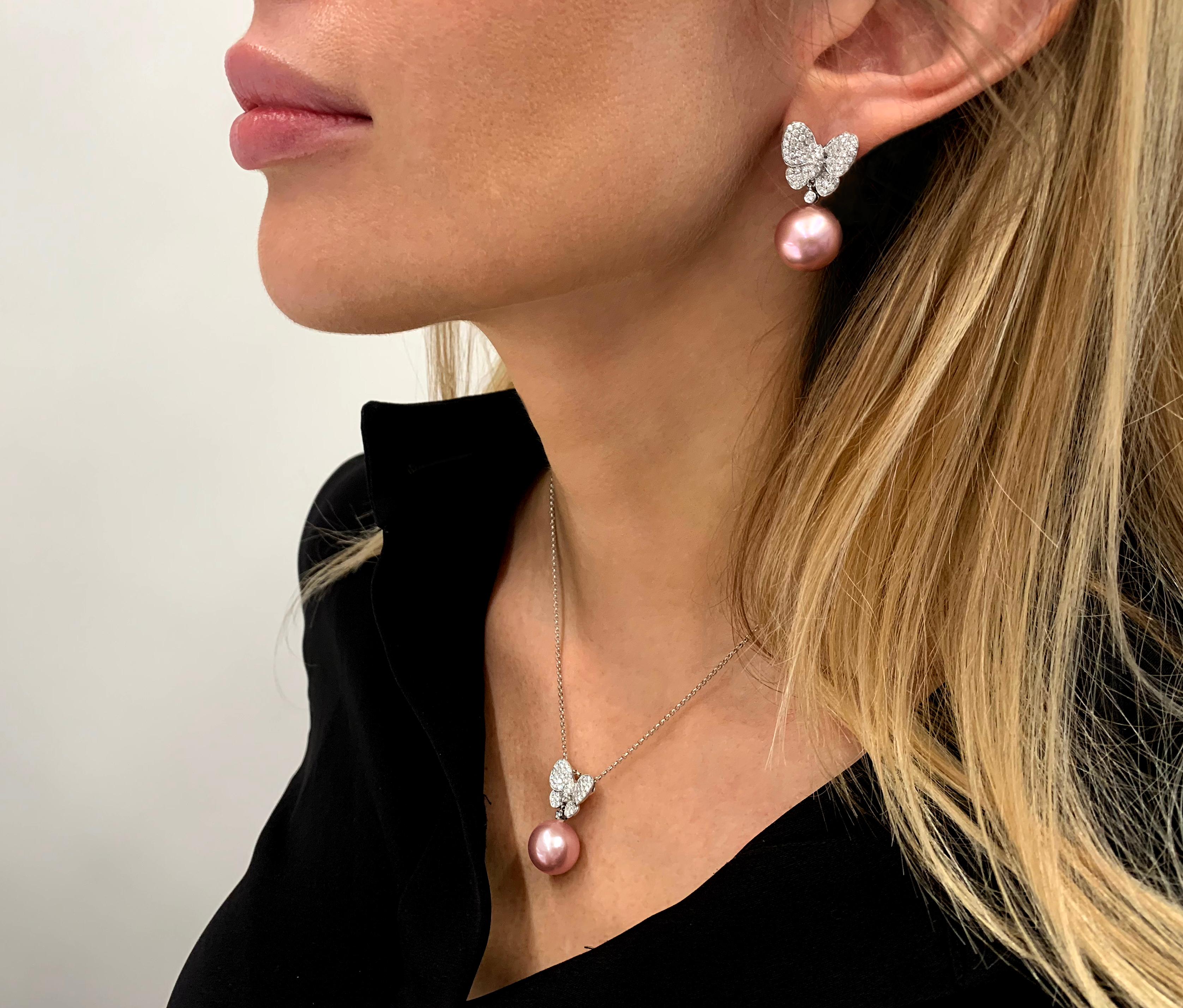 This intricate pendant and earring set by Yoko London features vivid pink Freshwater pearls beneath diamonds arranged in a butterfly motif. This playful suite is perfect for both daytime and evening looks and will add a sumptuous pop of colour to