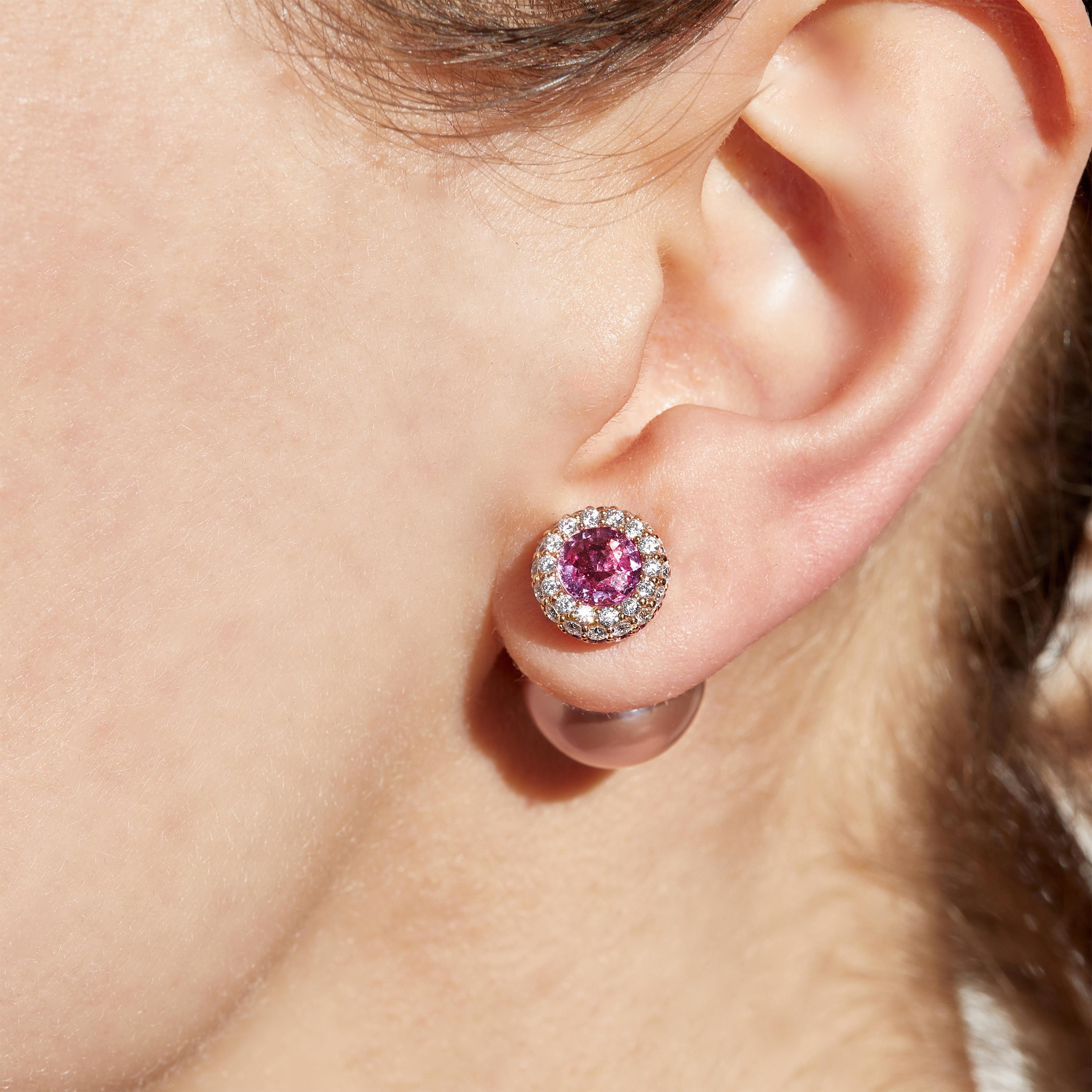 These contemporary earrings by Yoko London combine vibrant, natural coloured pink Freshwater pearls with the vivid tones of pink sapphires and diamonds. Putting style at the forefront of their design, these unique earrings offer a contemporary way