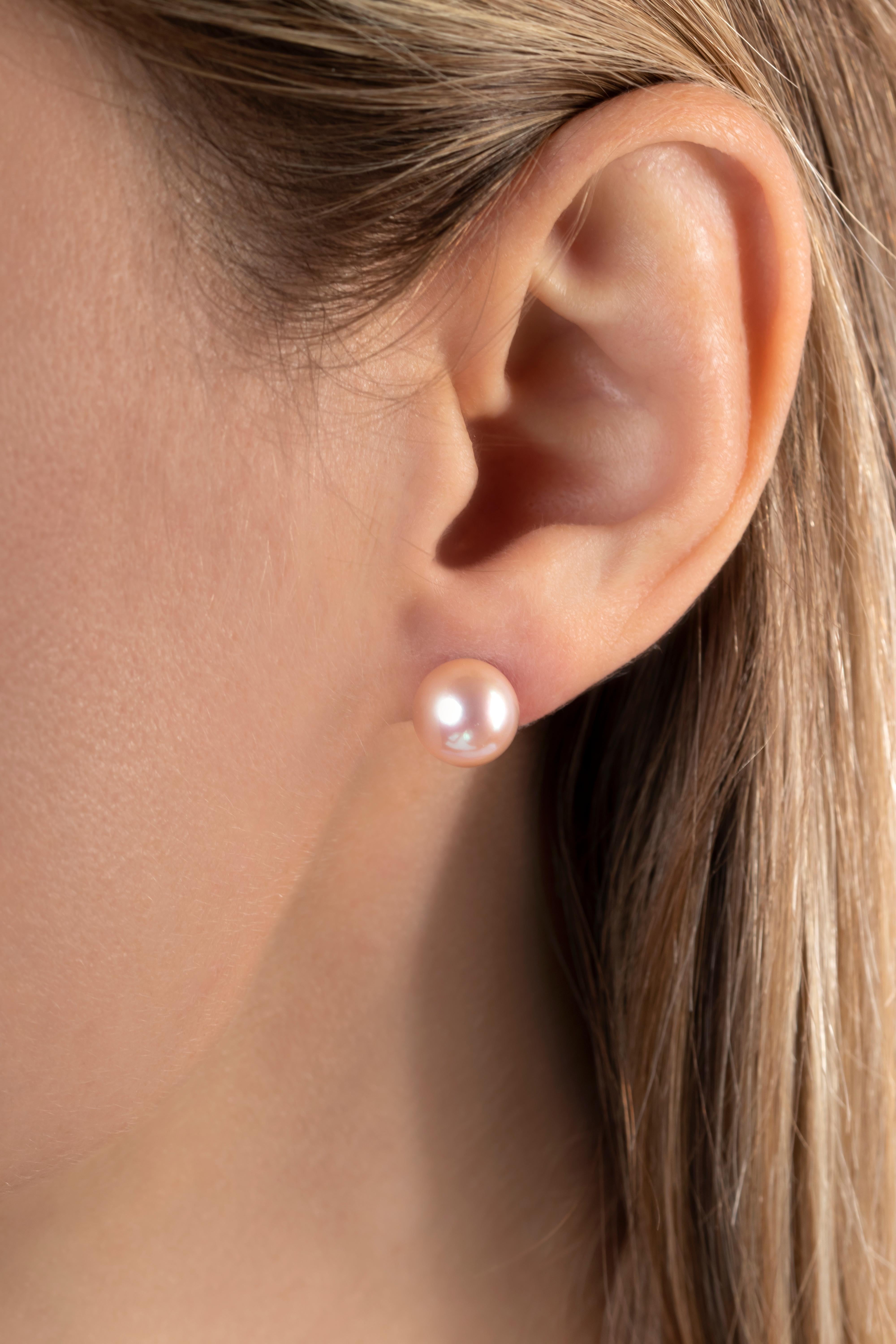 These elegant natural coloured Freshwater pearl studs from Yoko London are a jewellery box essential. The classic 18 Karat white gold setting allows the beautiful colour and lustre of the pearls to speak for themselves. Pair with any outfit to add a