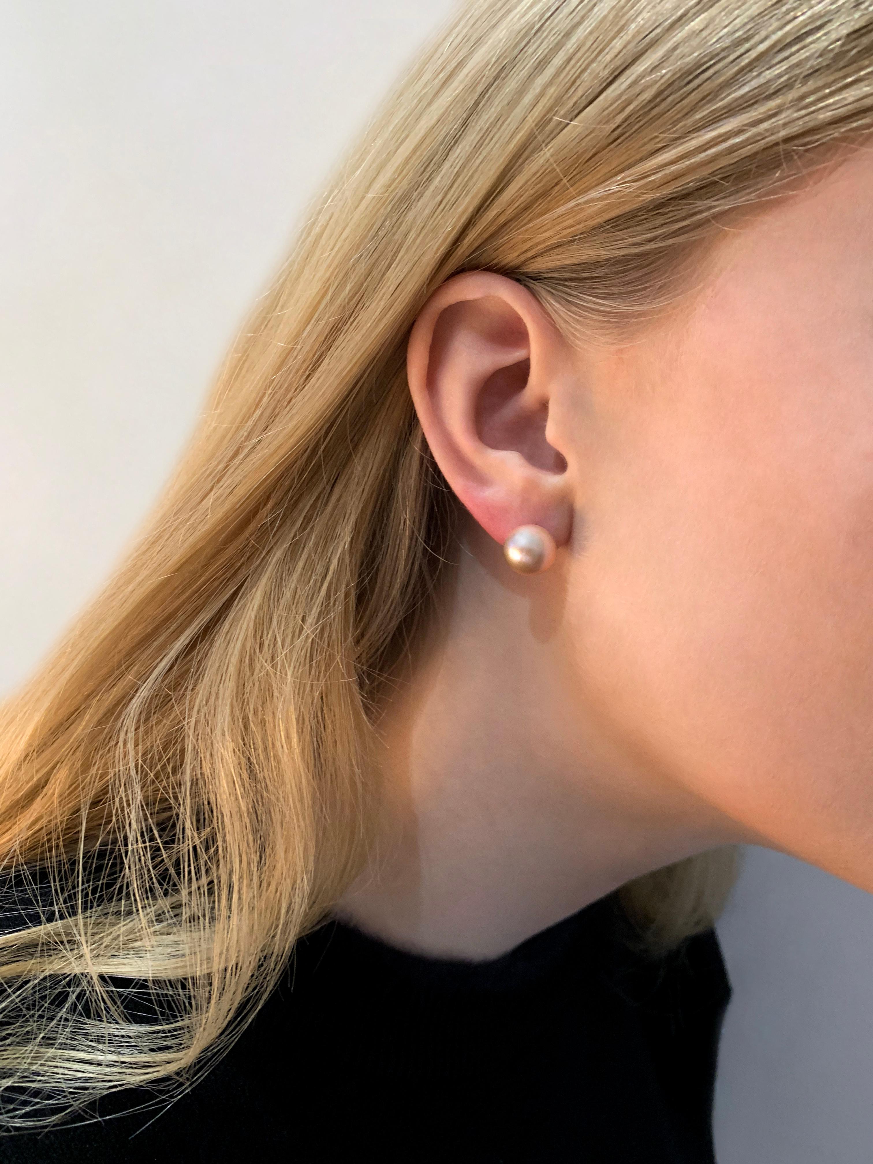 These elegant natural coloured Freshwater pearl studs from Yoko London are a jewellery box essential. The simple 18 Karat Yellow Gold setting allows the beautiful colour and lustre of the pearls to speak for themselves. Pair with any outfit to add a