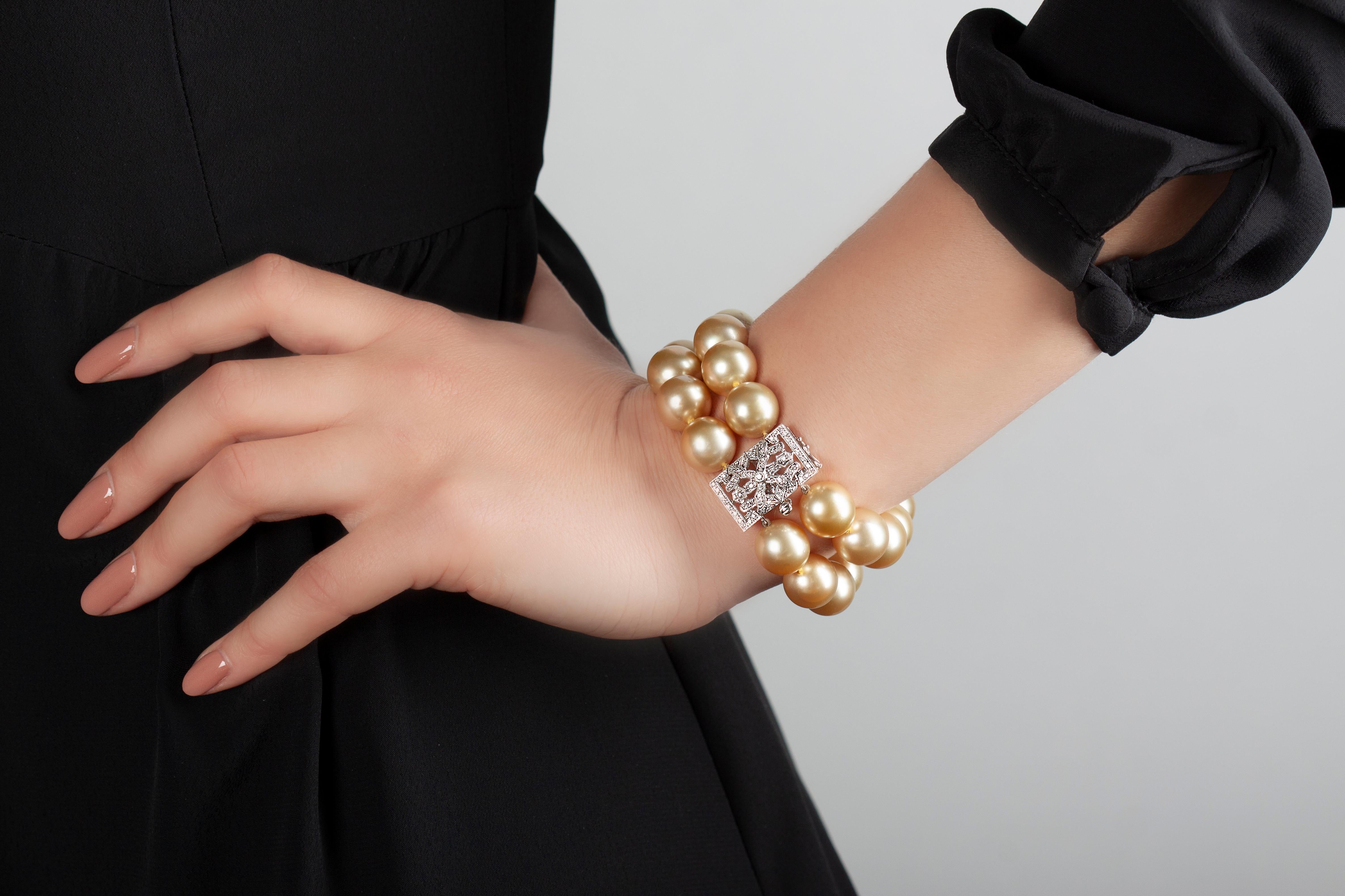 This sumptuous bracelet by Yoko London features two rows of vivid Golden South Sea pearls which are perfectly accentuated by a scintillating, art-deco style diamond clasp. The rarest of all pearl varieties, the Golden South Sea Pearls featured in