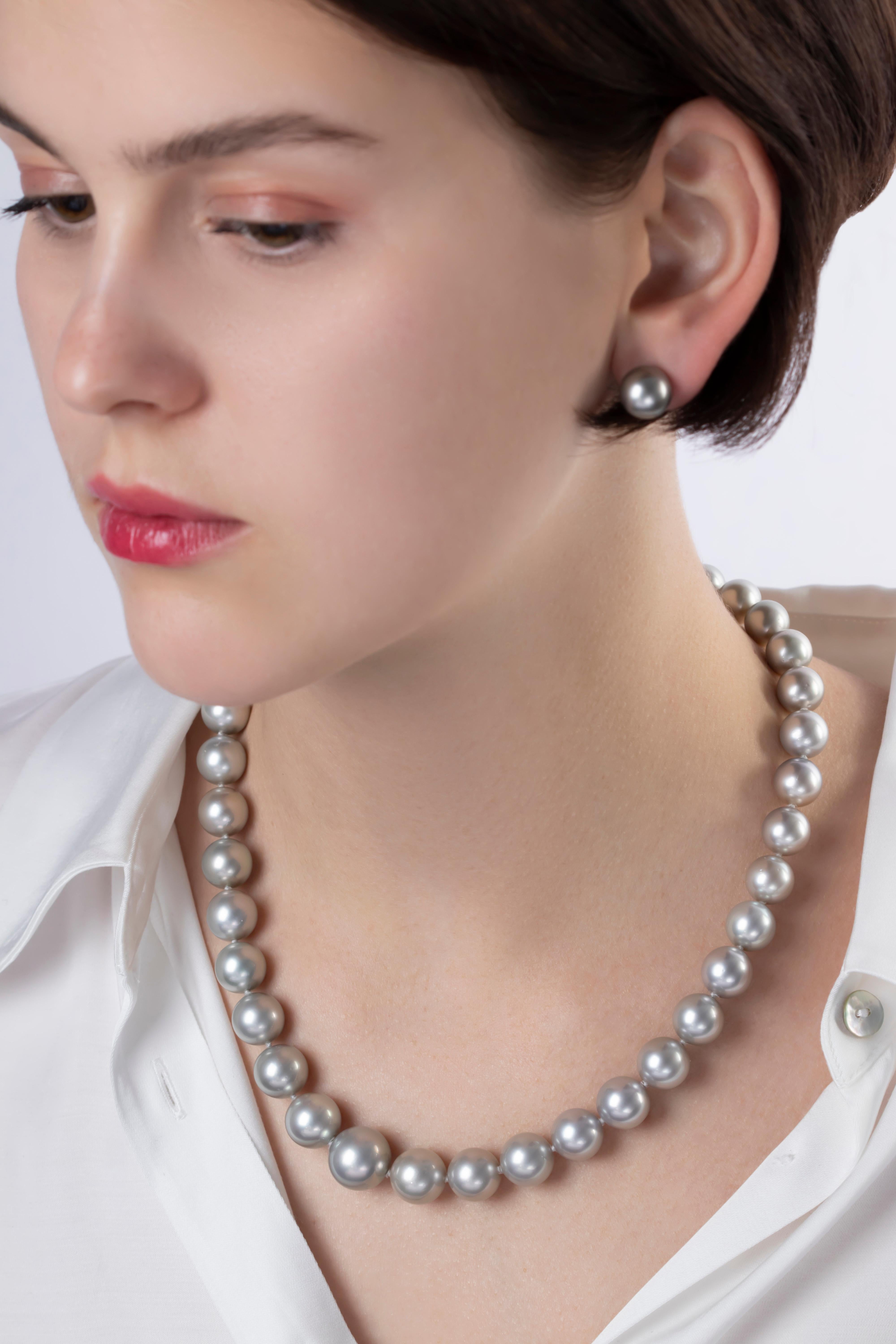 These elegant earrings by Yoko London feature lustrous, natural colour grey Tahitian pearls, set in 18 Karat white gold. A jewellery box essential, Tahitian pearl studs are both classic and striking. Each pearl is expertly matched and set in our