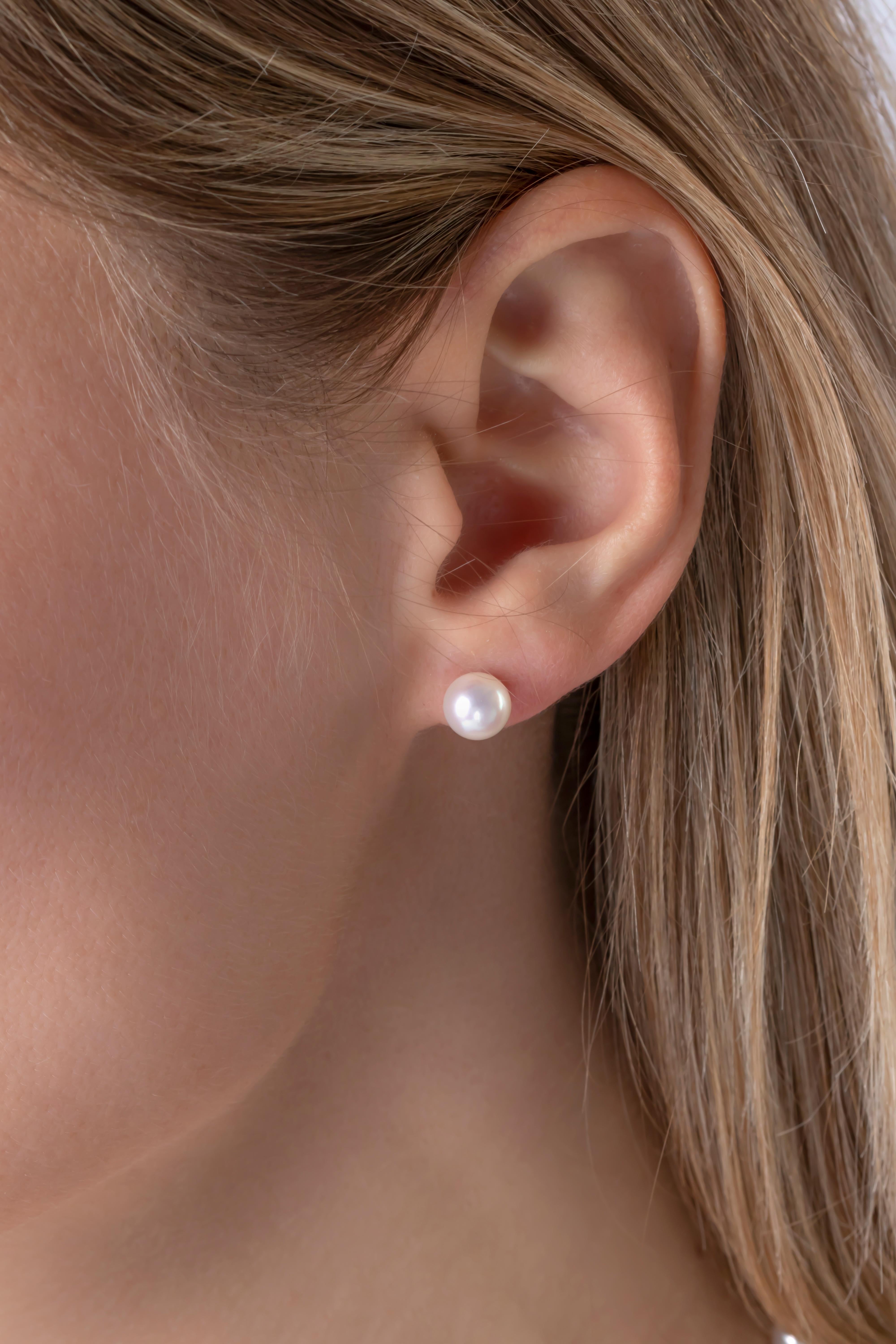 These timeless stud earrings by Yoko London feature high quality 6-6.5mm Japanese Akoya pearls on a traditional 18 Karat White Gold post and scroll fitting. Classic and elegant, these lustrous pearl earrings are an essential for every jewellery